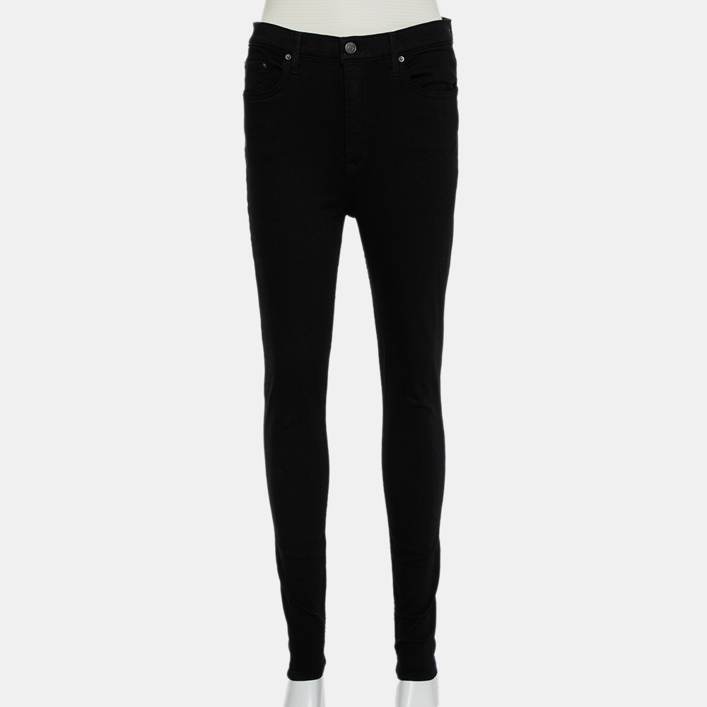A casual pair of skinny fit Kendall jeans for women by Grlfrnd. Made from a cotton blend the black pair of jeans has five pockets front zip button closure and a comfortable fit.