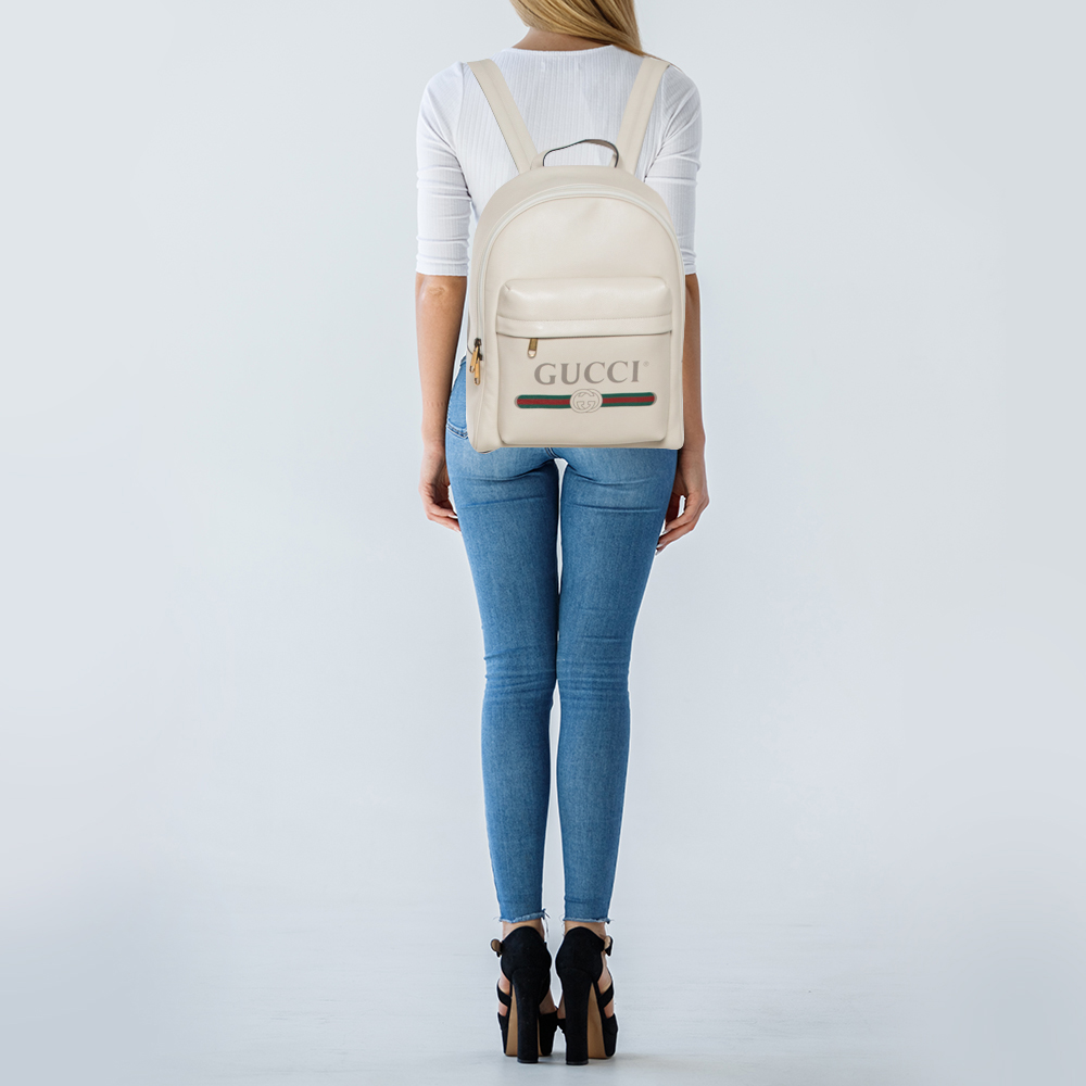 

Gucci Off White Leather Logo Print Backpack