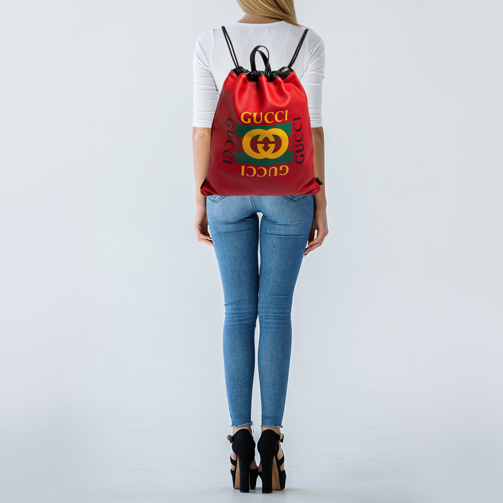 

Gucci Red Leather Logo Drawstring Backpack