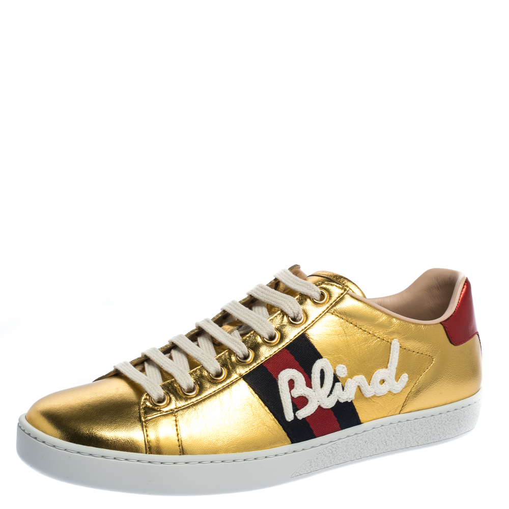 white and gold gucci sneakers