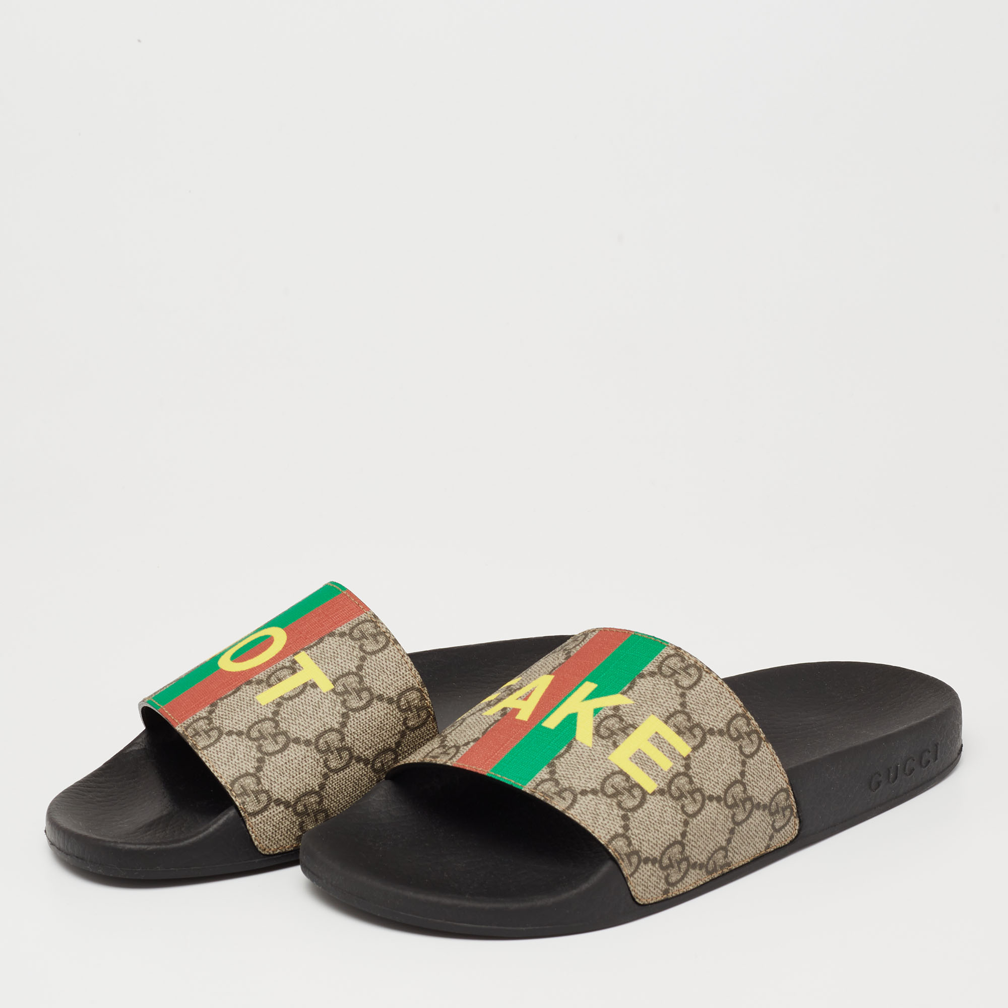 

Gucci Beige Not Fake Print GG Supreme Canvas Slide Flat Sandals Size, Grey