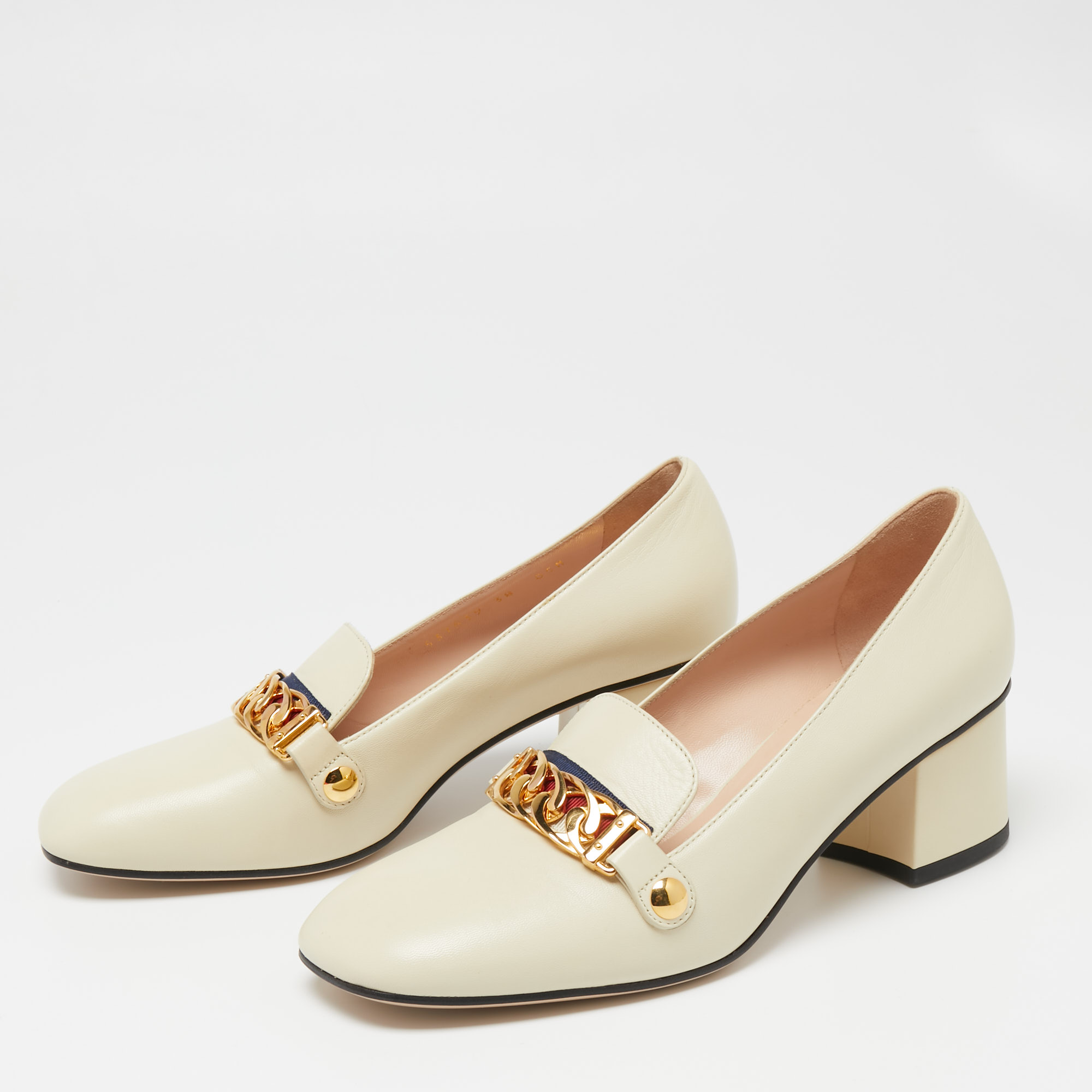 

Gucci Cream Leather Sylvie Chain Embellished Pumps Size