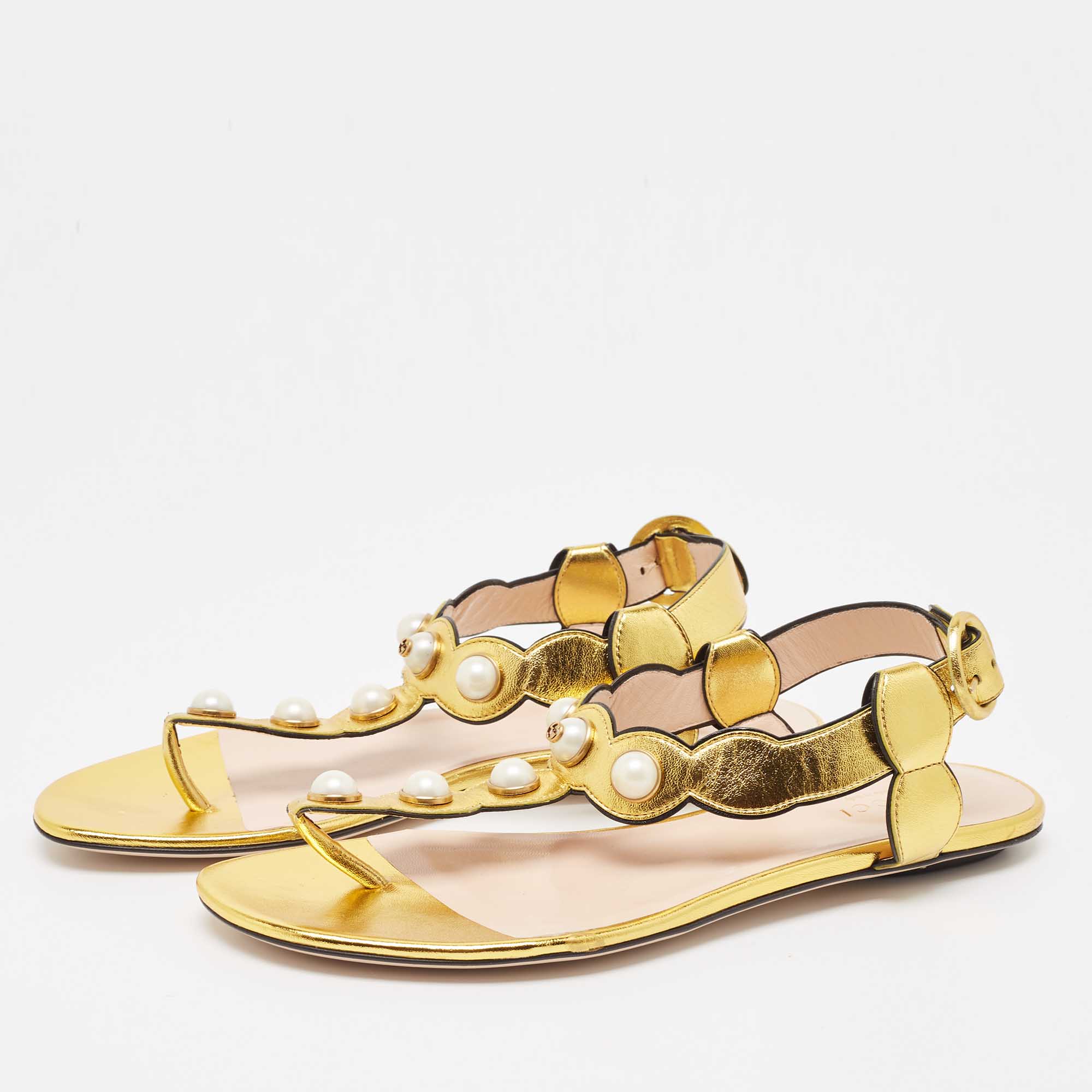 

Gucci Gold Scalloped Leather Faux Pearl Embellished Thong Flat Sandals Size