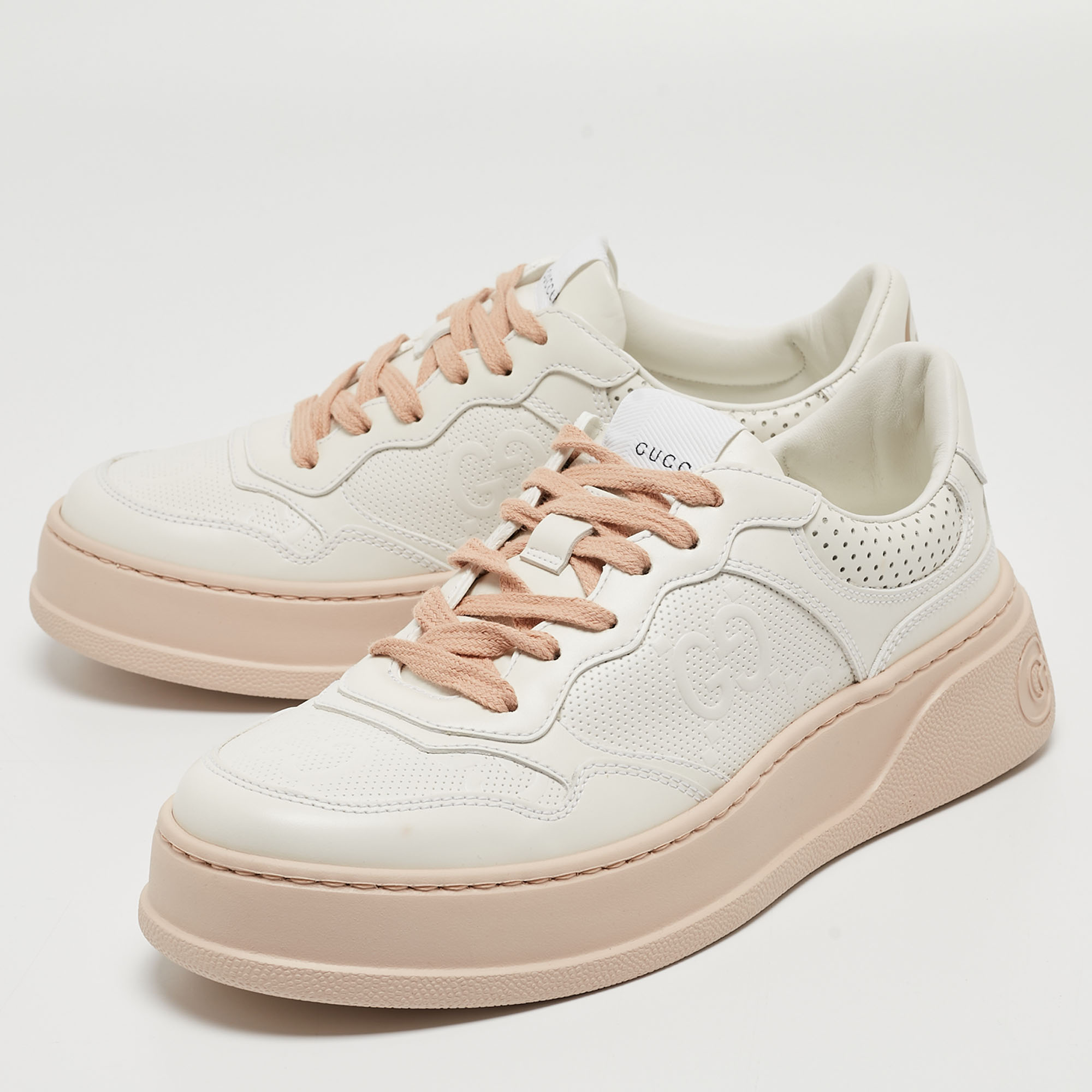 

Gucci White GG Embossed Leather Low Top Sneakers Size