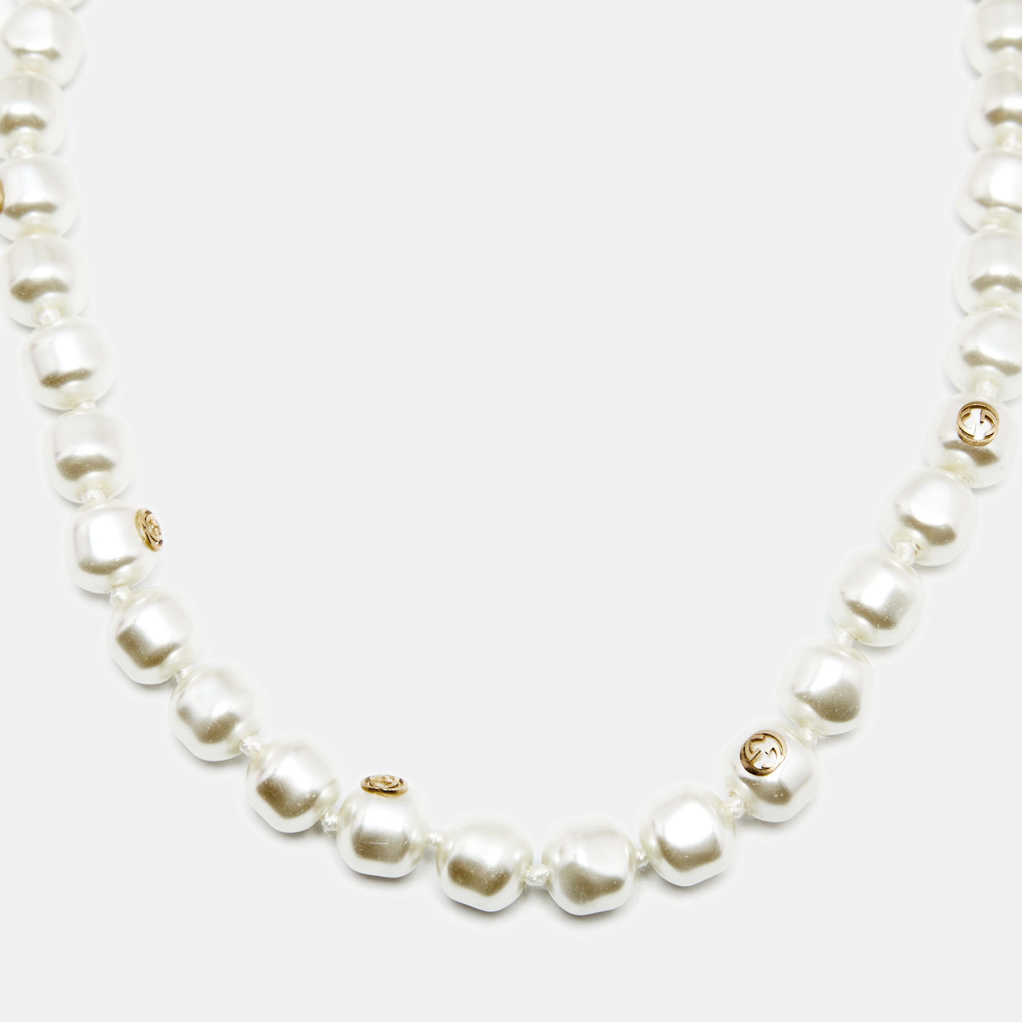 

Gucci Faux Pearls Ribbon Gold Tone Metal Beaded Necklace, White