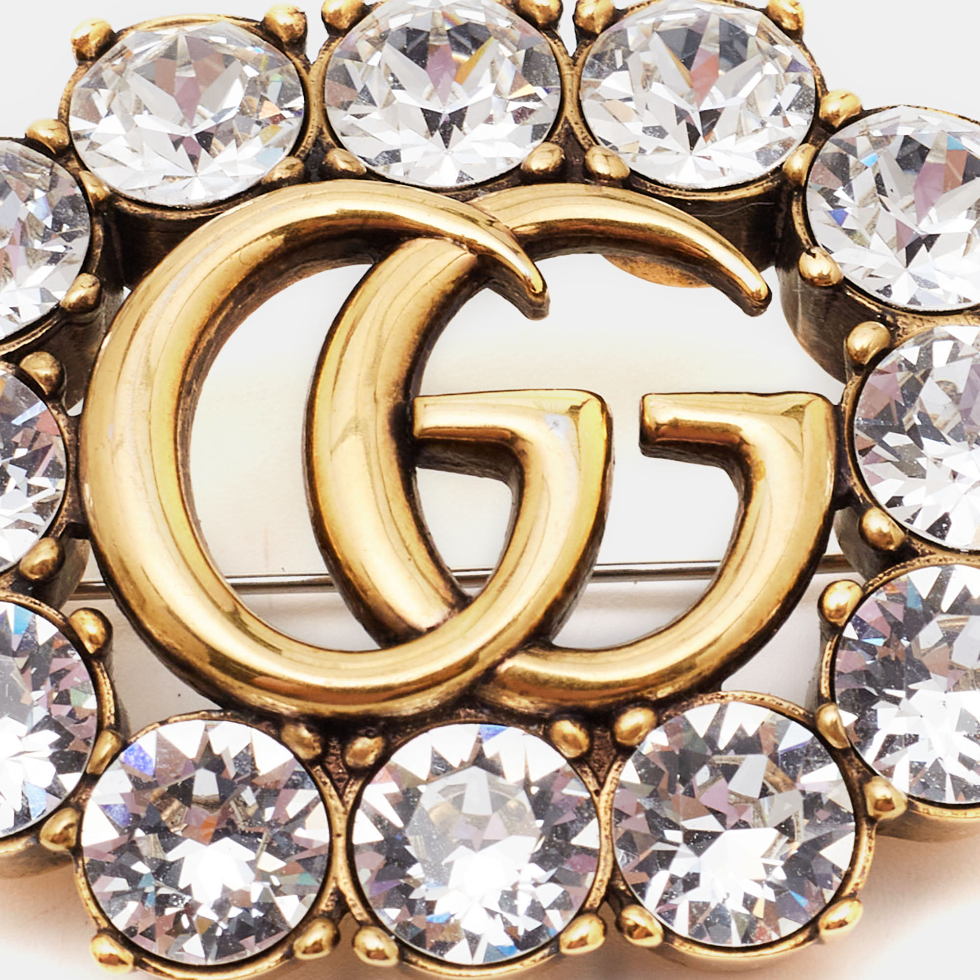 

Gucci Aged Gold Tone Crystal Double G Pin Brooch