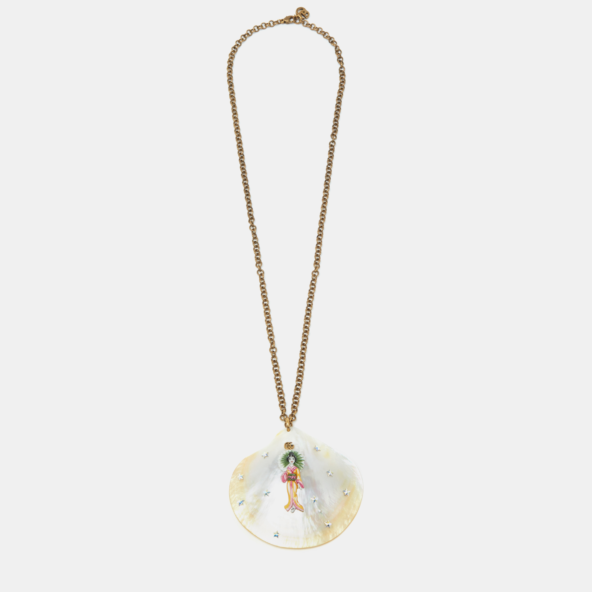 

Gucci Aged Gold Tone Mother of Pearl Shell Geisha Pendant Necklace