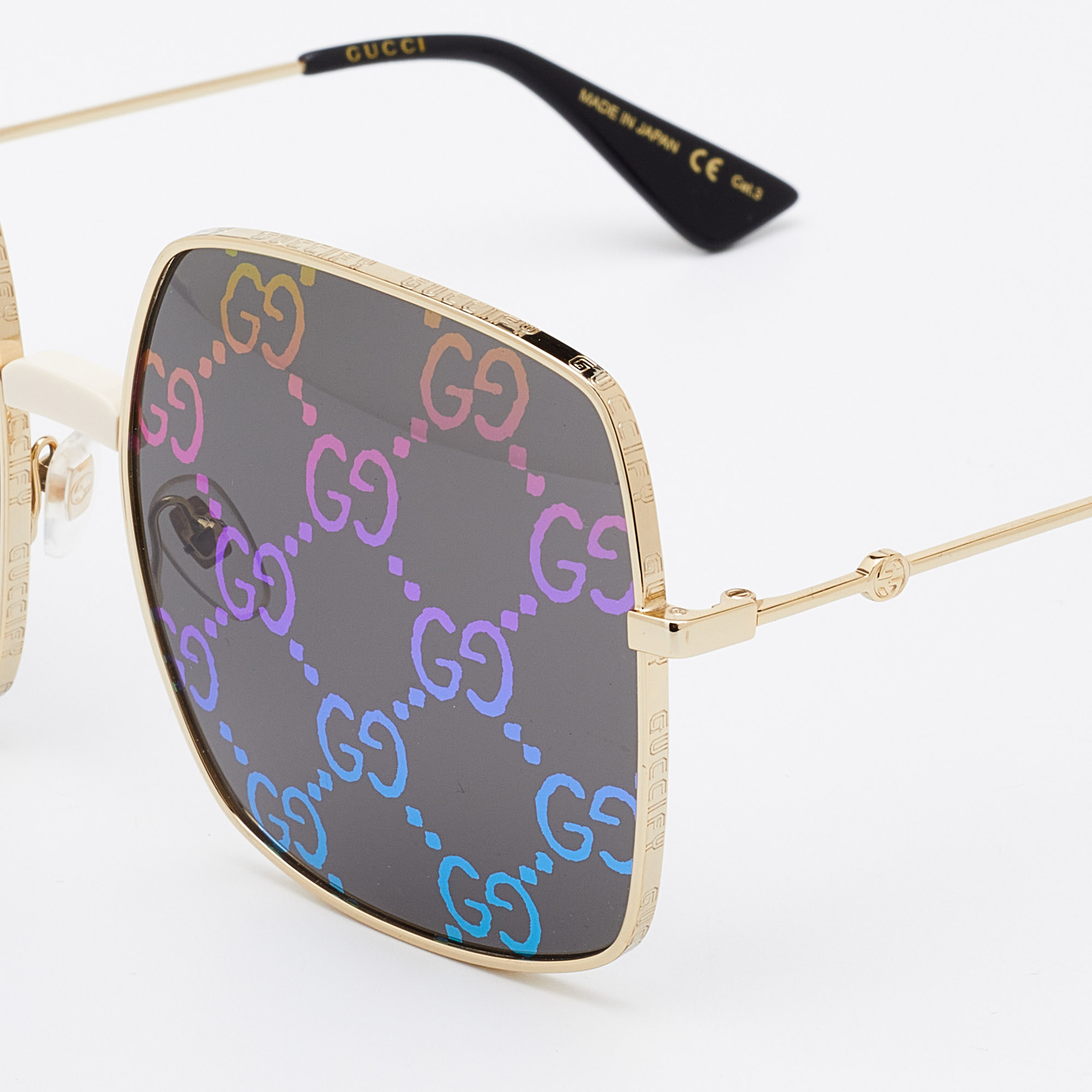 

Gucci Guccify Gold Tone/Grey GG0414S Monogram Detail Square Sunglasses, Metallic