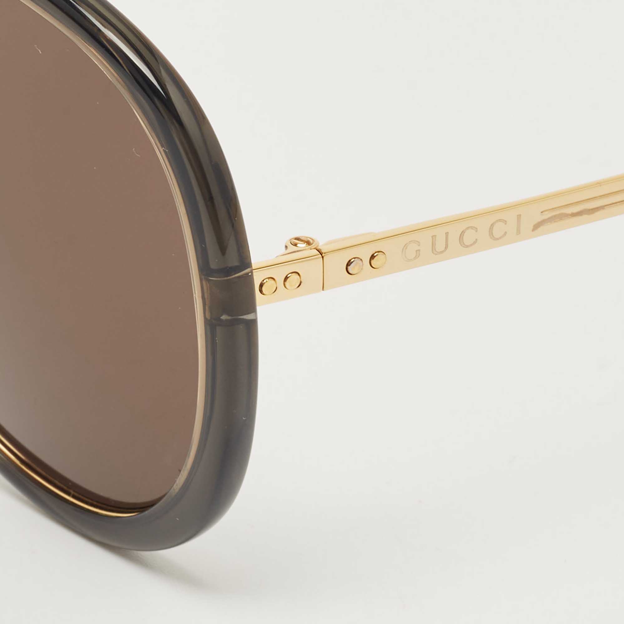 

Gucci Black/Gold GG094S Acetate and Metal Oversize Sunglasses