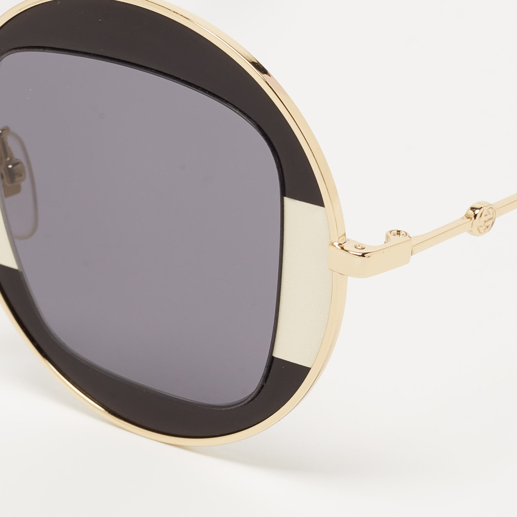 

Gucci Black/Gold GG0105S Round Sunglasses