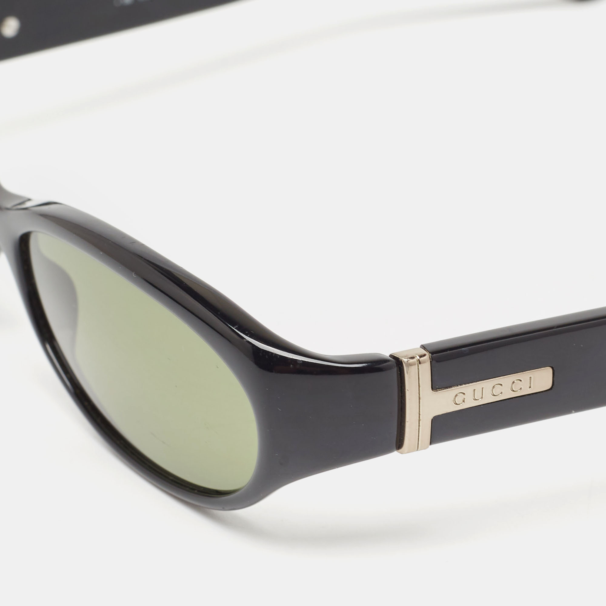 

Gucci Black GG2504/S Rimmed Oval Sunglasses