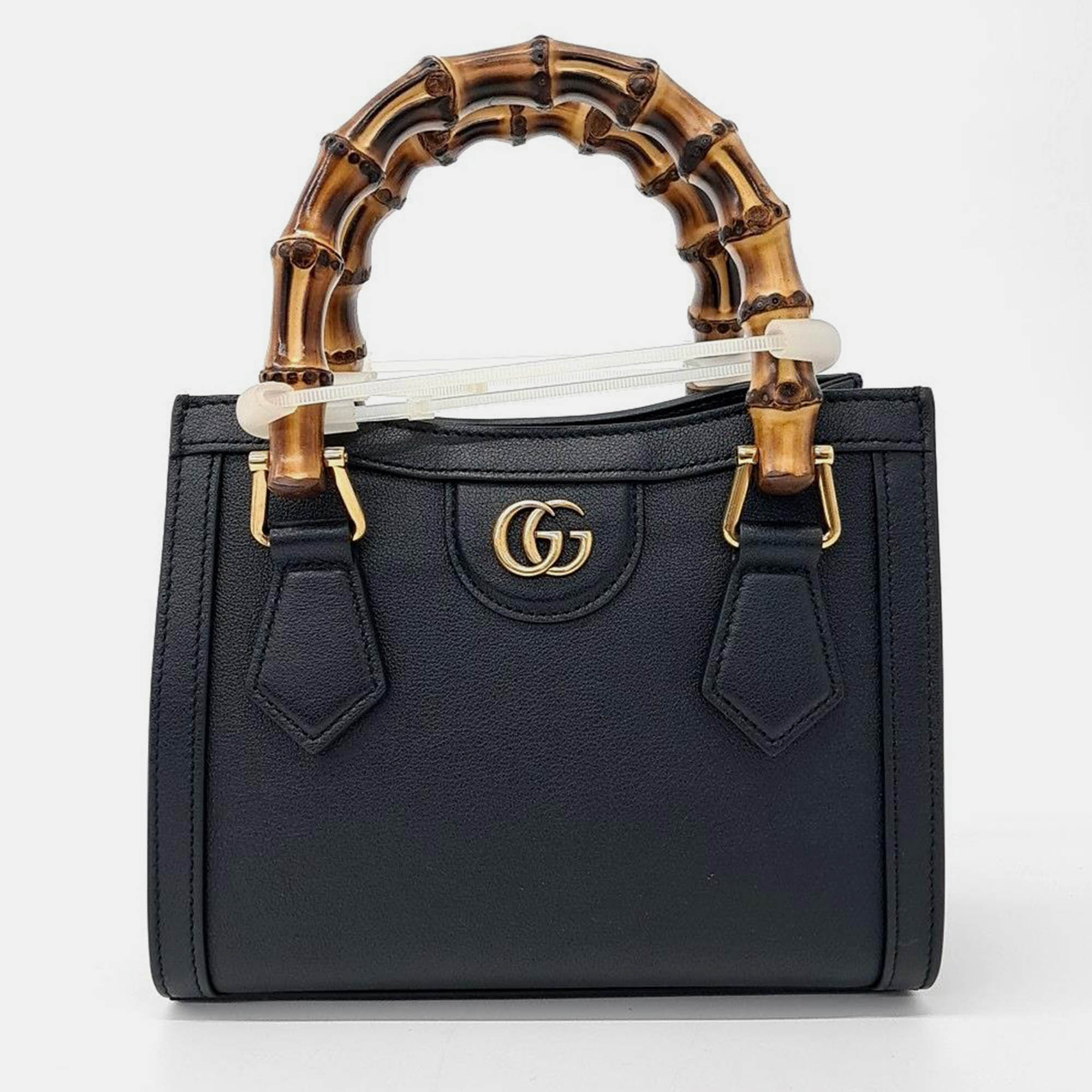 

Gucci Black Leather Diana Handbag