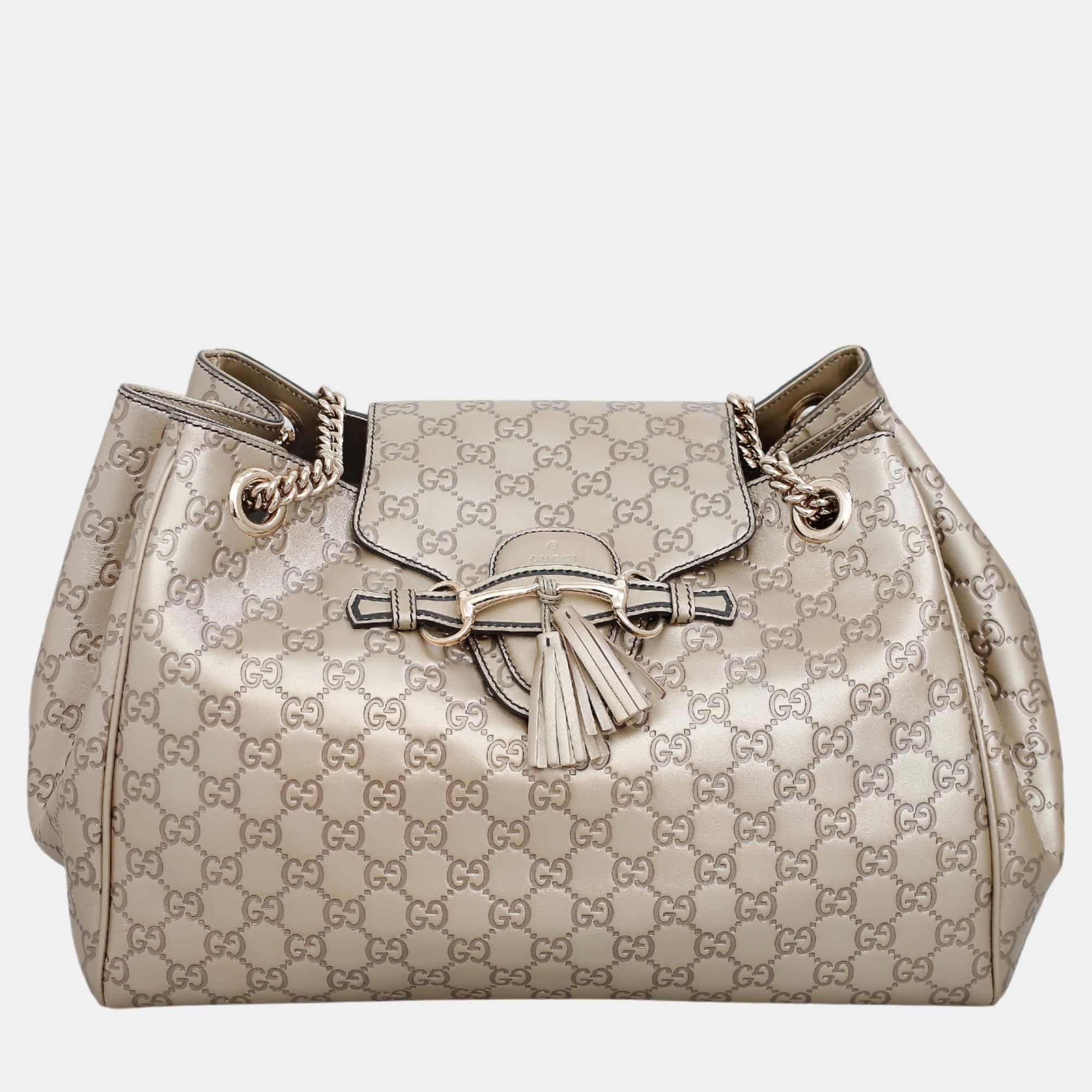 

Gucci GG Embossed Shoulder Bag, Gold