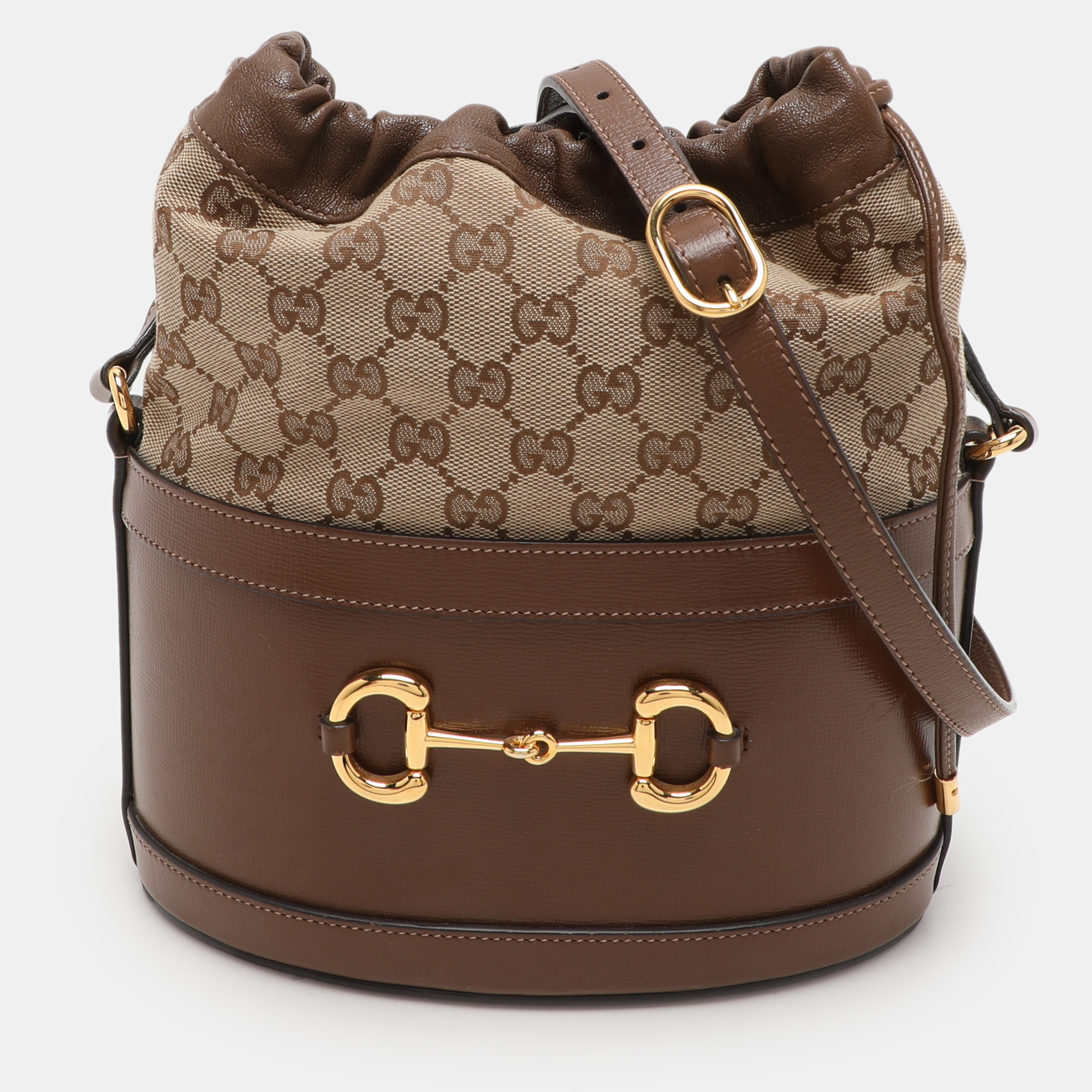 

Gucci Brown/Beige GG Canvas and Leather Horsebit 1955 Drawstring Bucket Bag