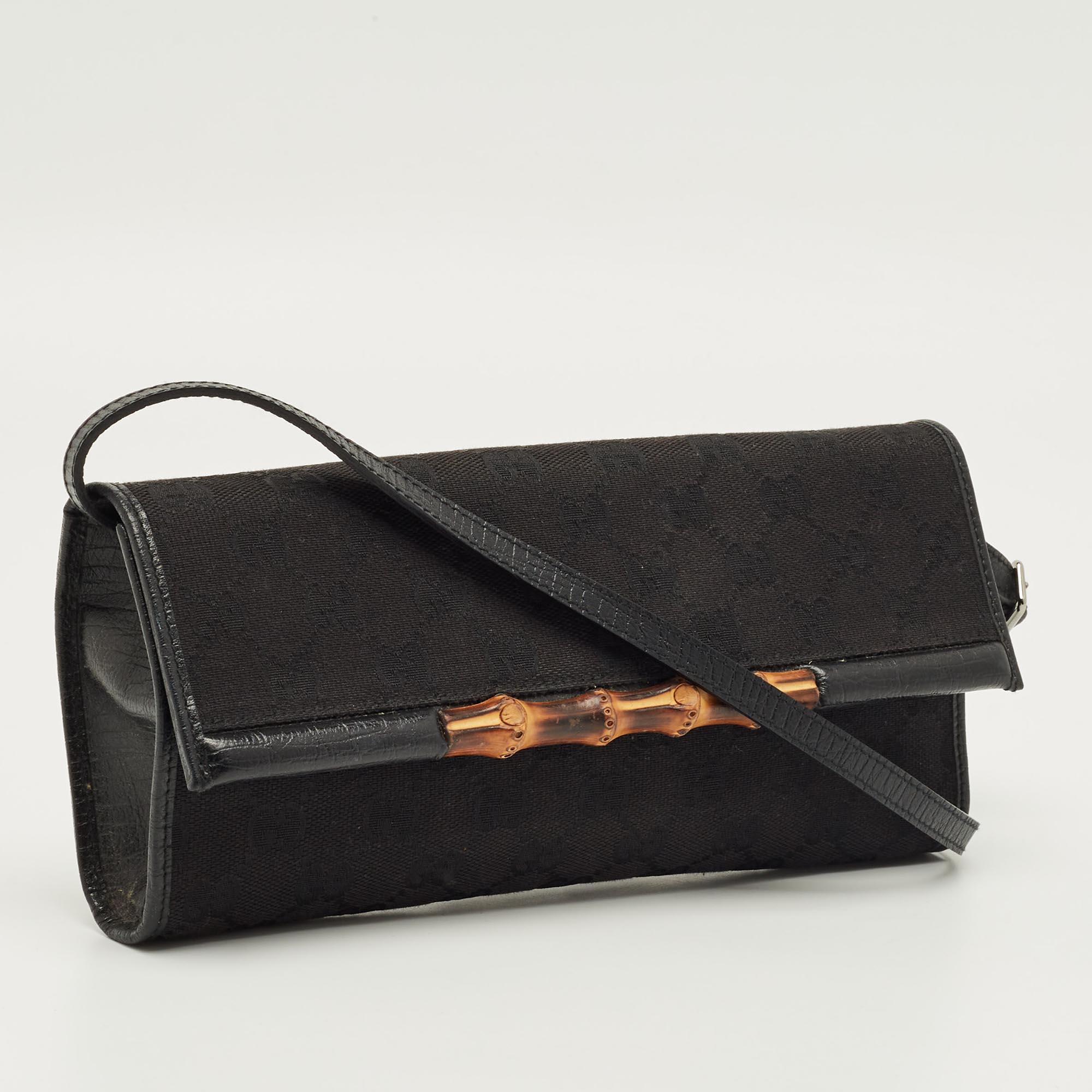 

Gucci Black GG Canvas and Leather Bamboo Flap Clutch Bag