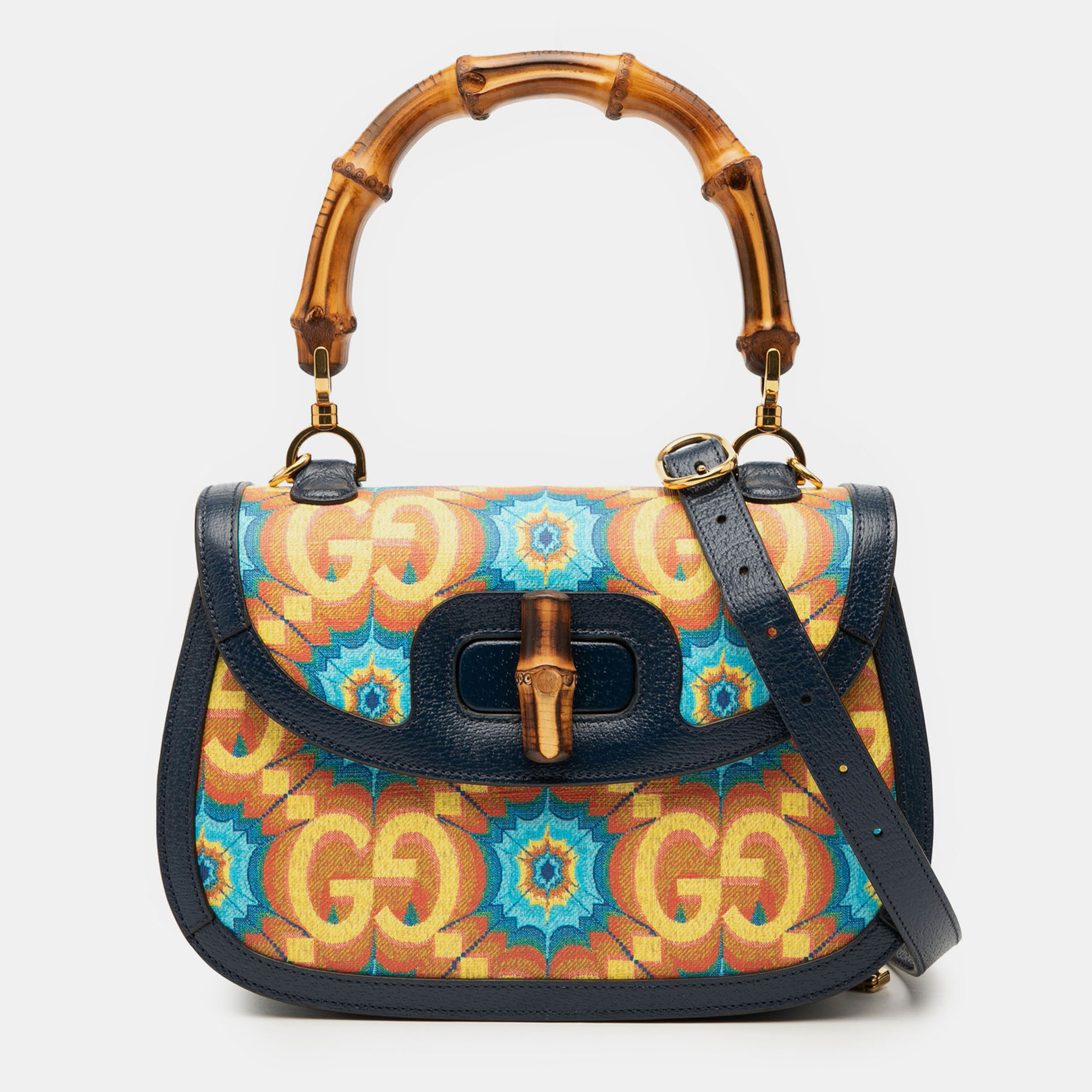 Click to view more detailed imagery on our partner's website Pre-owned Gucci Blue 100th Anniversary Medium Gg Coated Canvas Kaleidoscope 1947 Bamboo Top Handle Bag