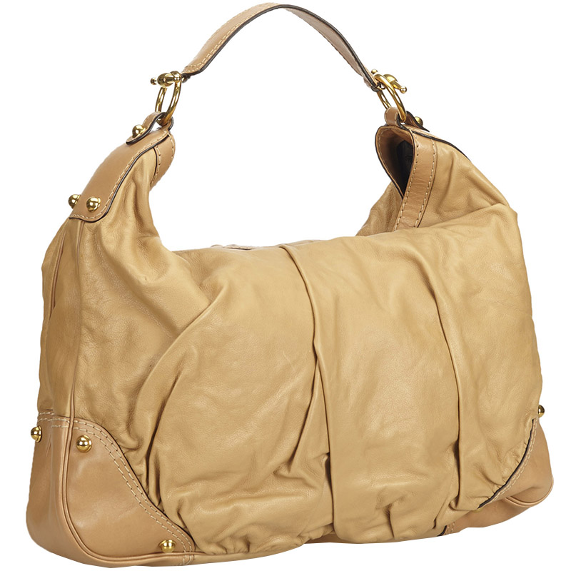 

Gucci Beige Leather Jockey Hobo Bag