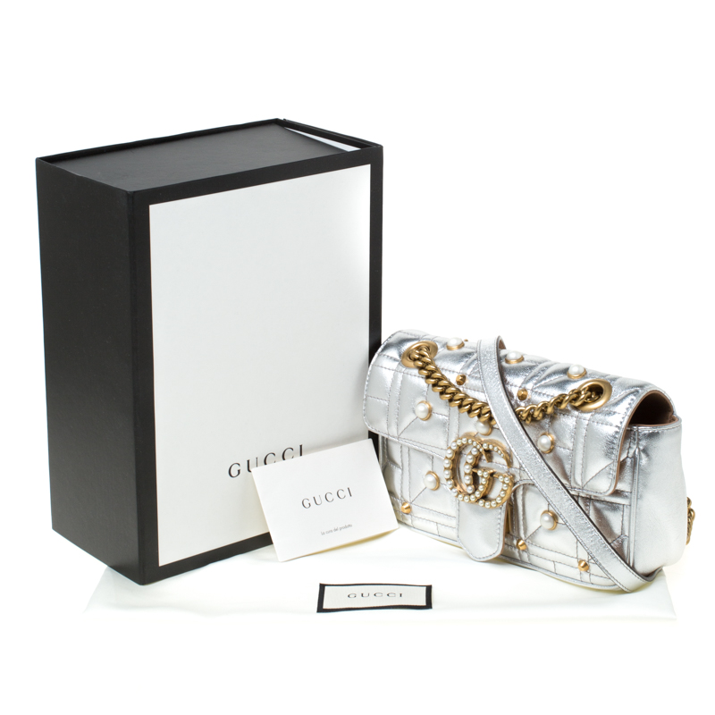 Original Gucci with Gucci box and Gucci dust bag; silver…