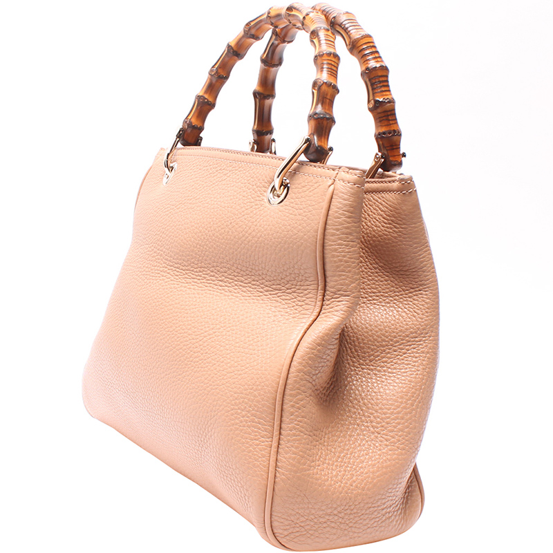 

Gucci Pink Pebbled Leather Mini Bamboo Top Handle Bag