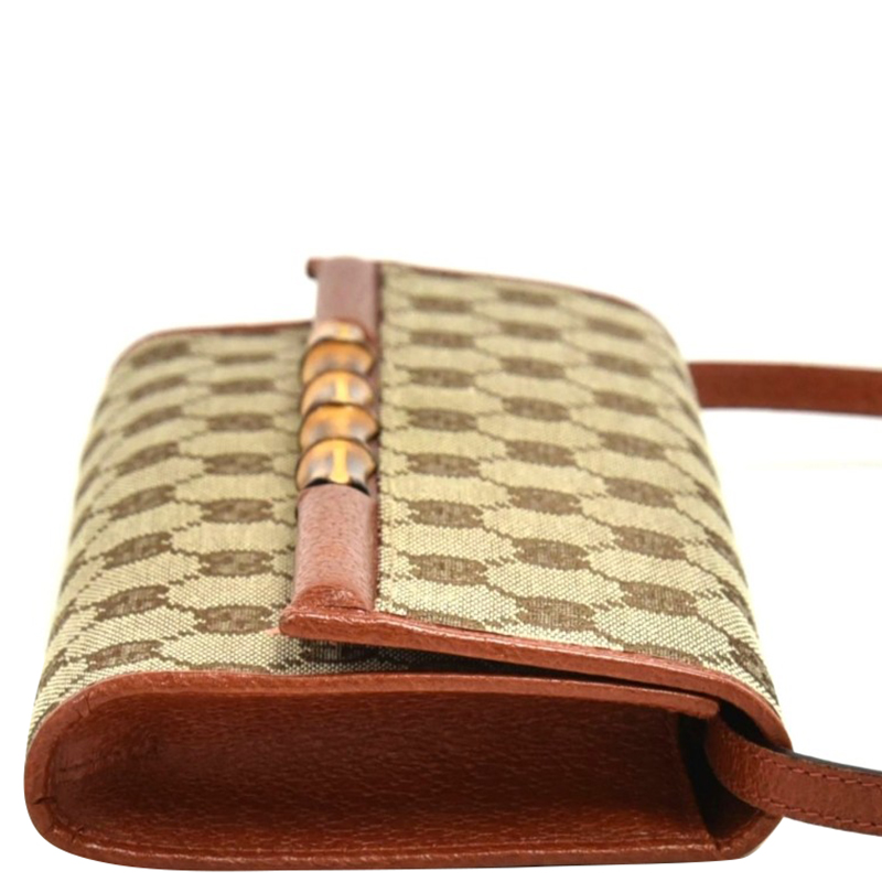 

Gucci Gray GG Canvas and Leather Bamboo Clutch, Grey