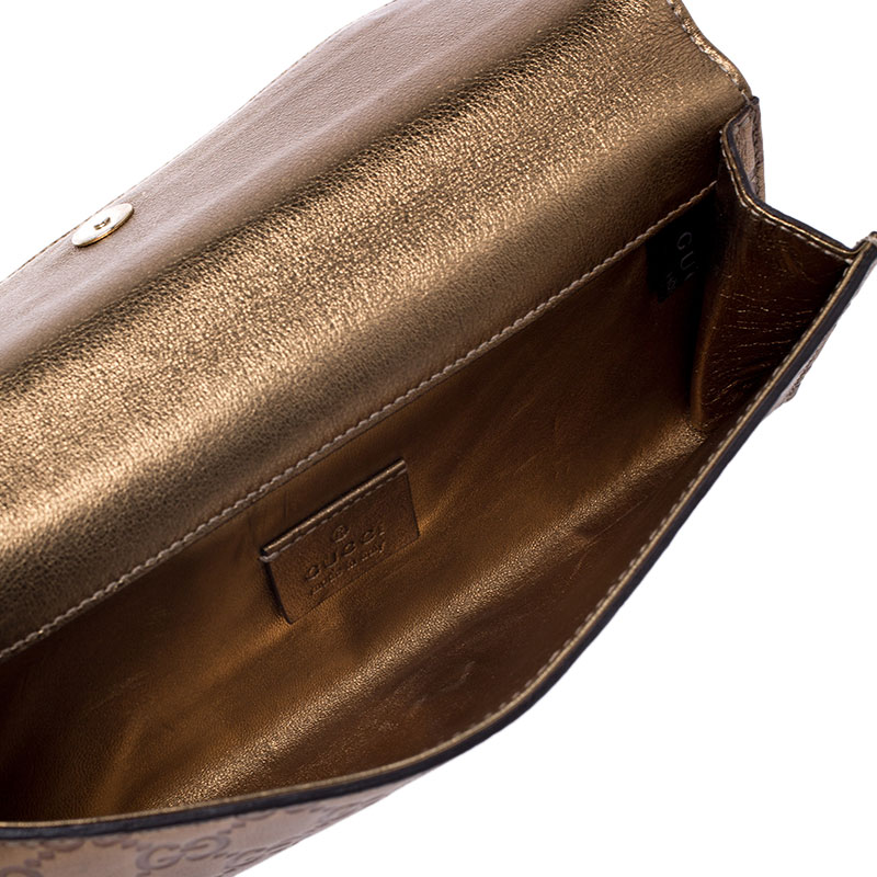 

Gucci Gold Guccissima Leather Buckle Continental Wallet