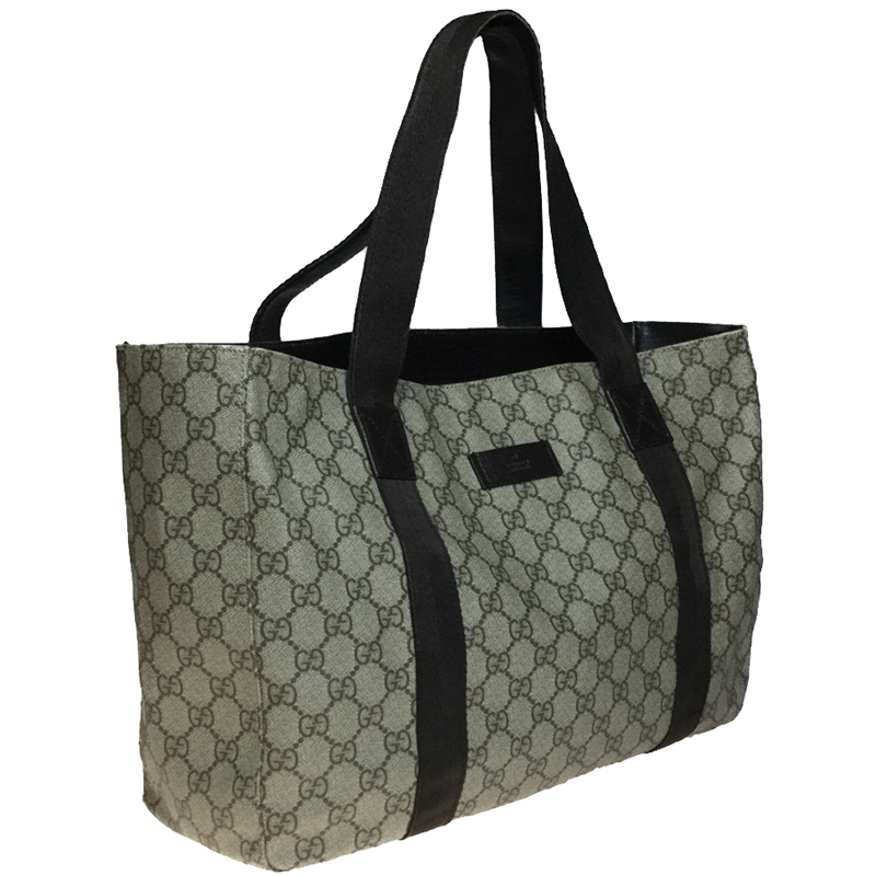 

Gucci Brown/Beige PVC Leather GG PVC Tote Bag