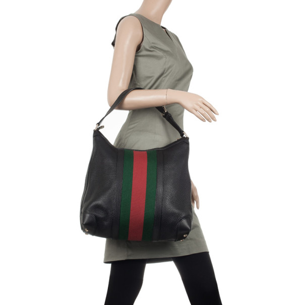 black gucci bag with red and green stripe