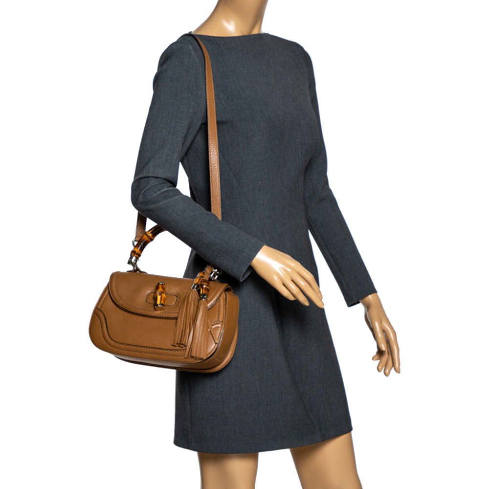 

Gucci Tan Leather Medium Tassel Bamboo Top Handle Bag