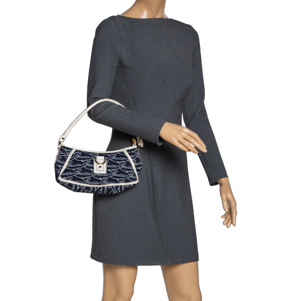 

Gucci Navy Blue Signature Canvas and Leather Abbey D-Ring Baguette Bag