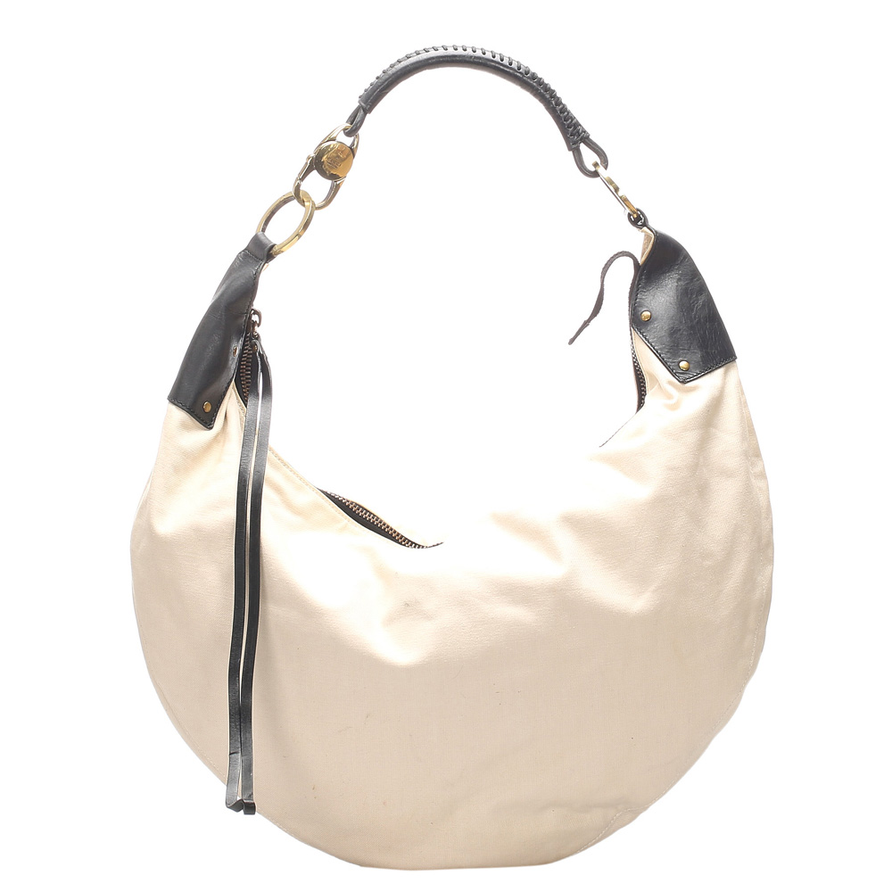Click to view more detailed imagery on our partner's website Pre-owned Gucci White/black Canvas Hobo Bag