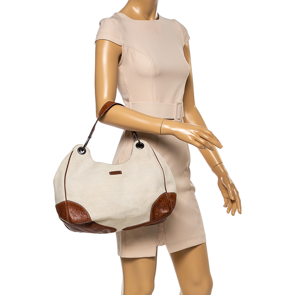 

Gucci Cream/Tan Canvas and Leather Hobo, Beige