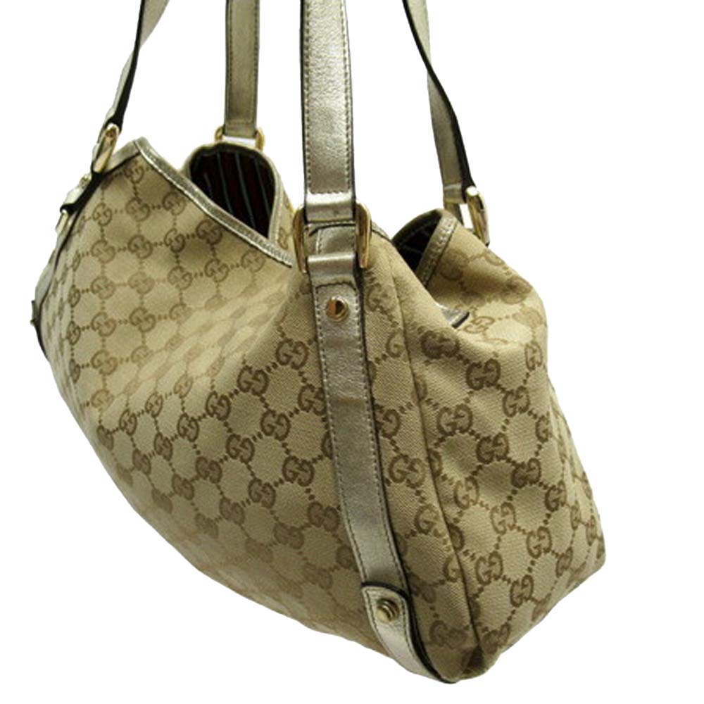 

Gucci Beige Canvas, Leather Abbey Totes