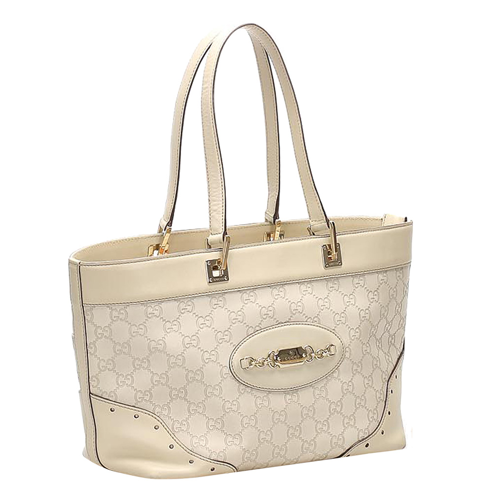 

Gucci Cream Guccissima Leather Punch Tote Bag