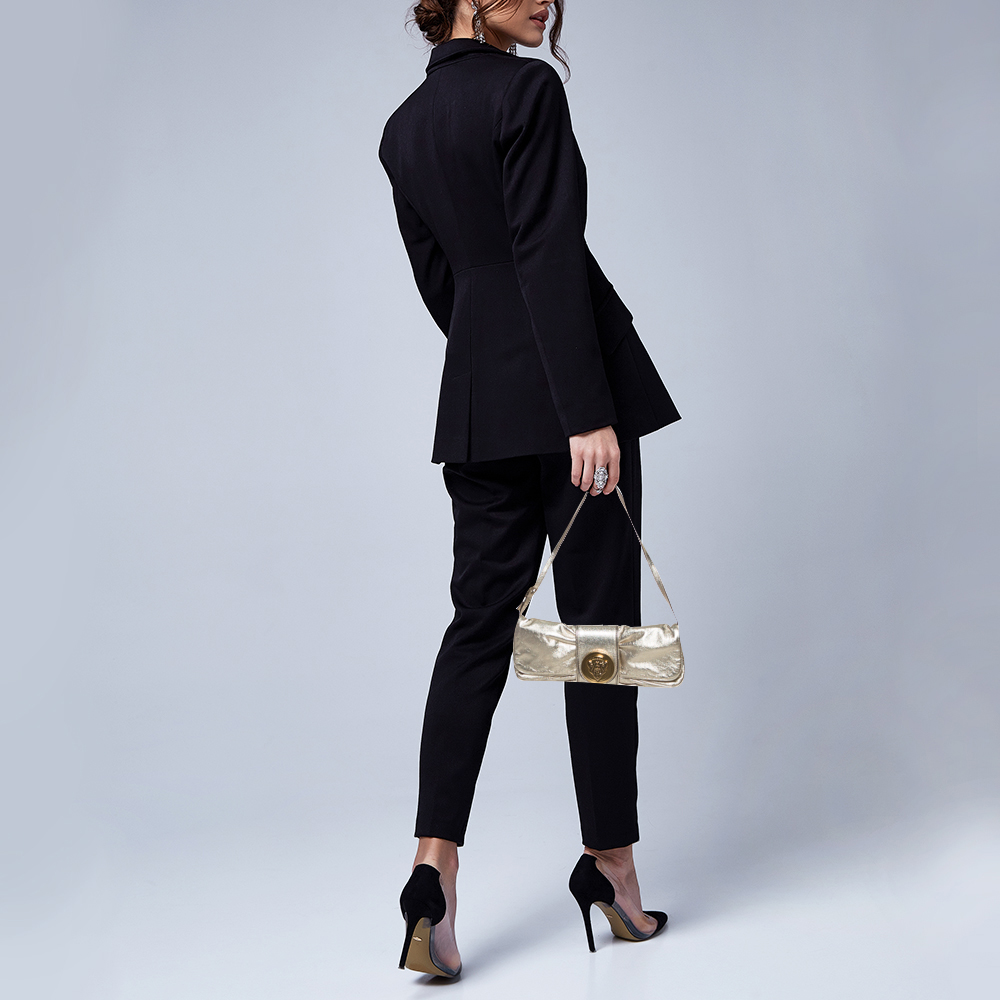 

Gucci Metallic Gold Leather Hysteria Clutch Bag