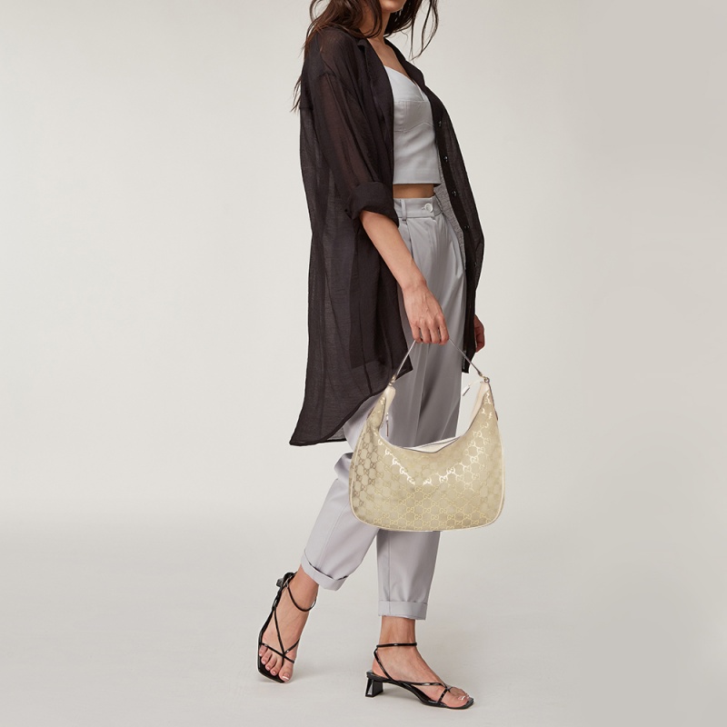 

Gucci Beige GG Suede and Leather Charmy Hobo
