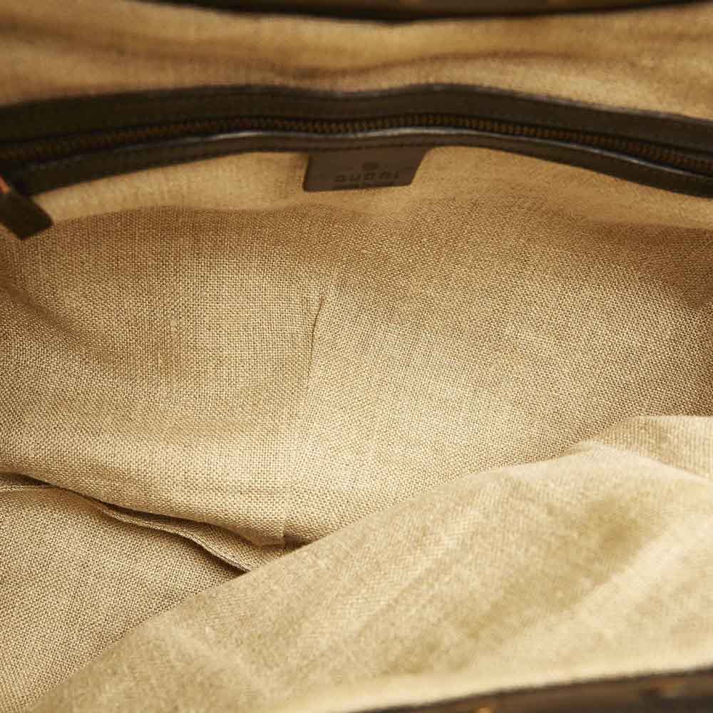 

Gucci Black Leather Bamboo Clutch Bag
