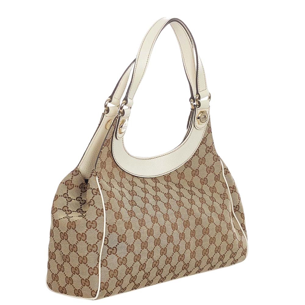 

Gucci Beige Canvas, Leather Charmy Shoulder Bag