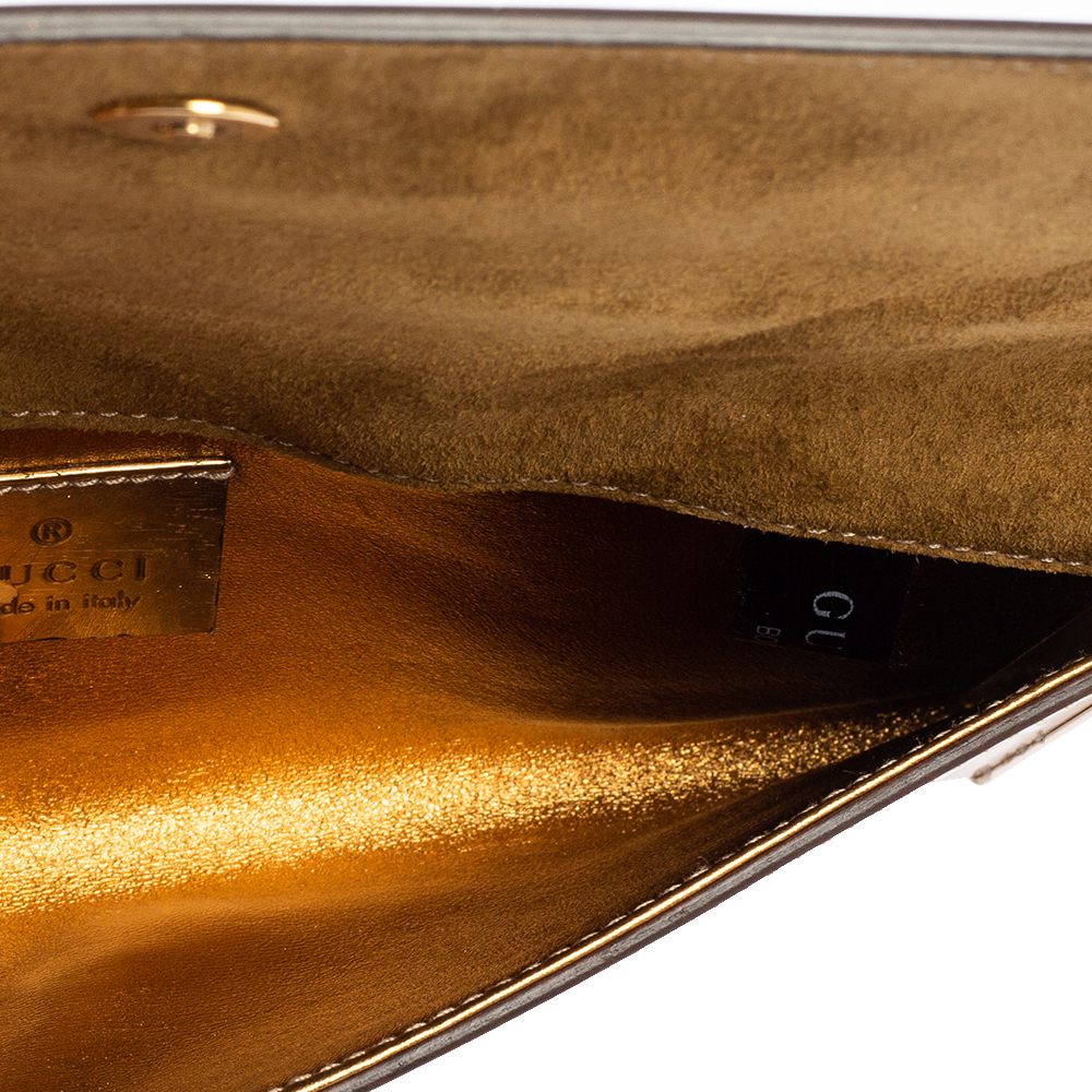 

Gucci Metallic Gold Leather and Mink Fur Crystal Tassel Clutch