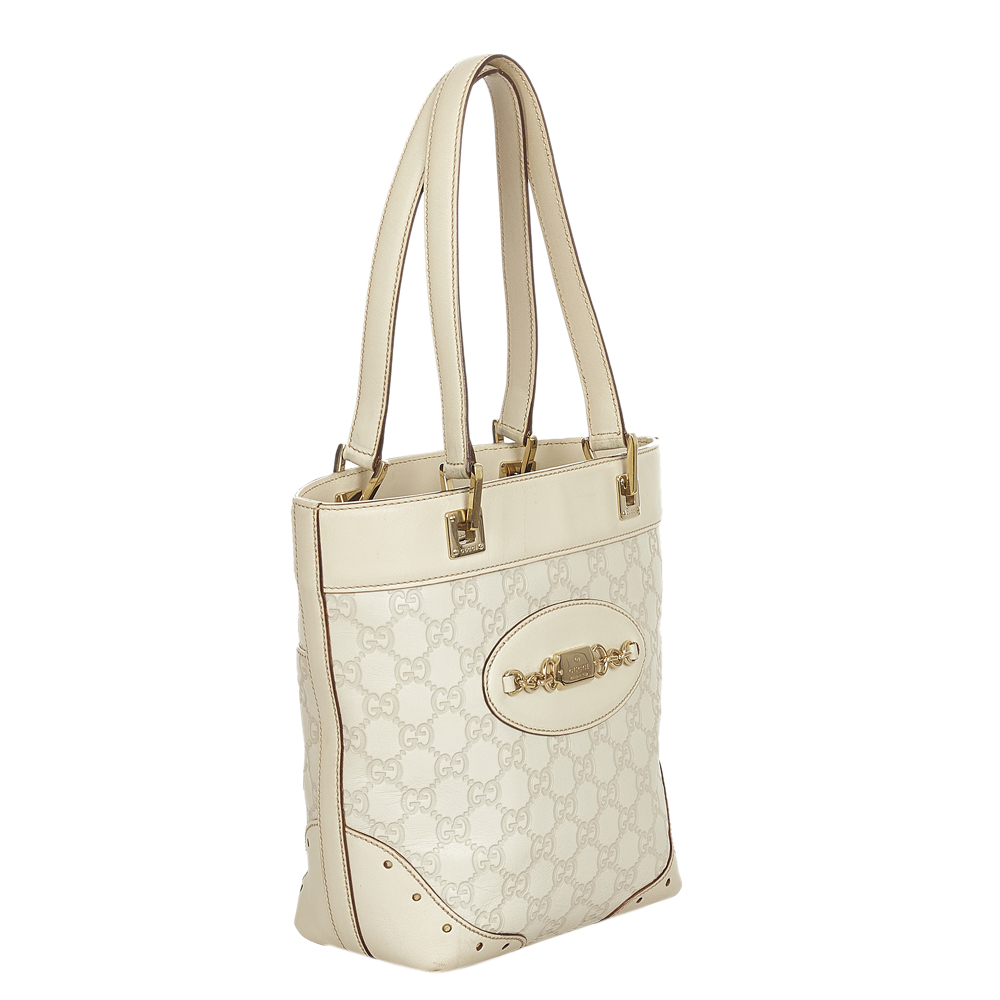 

Gucci White Leather Punch Tote Bag