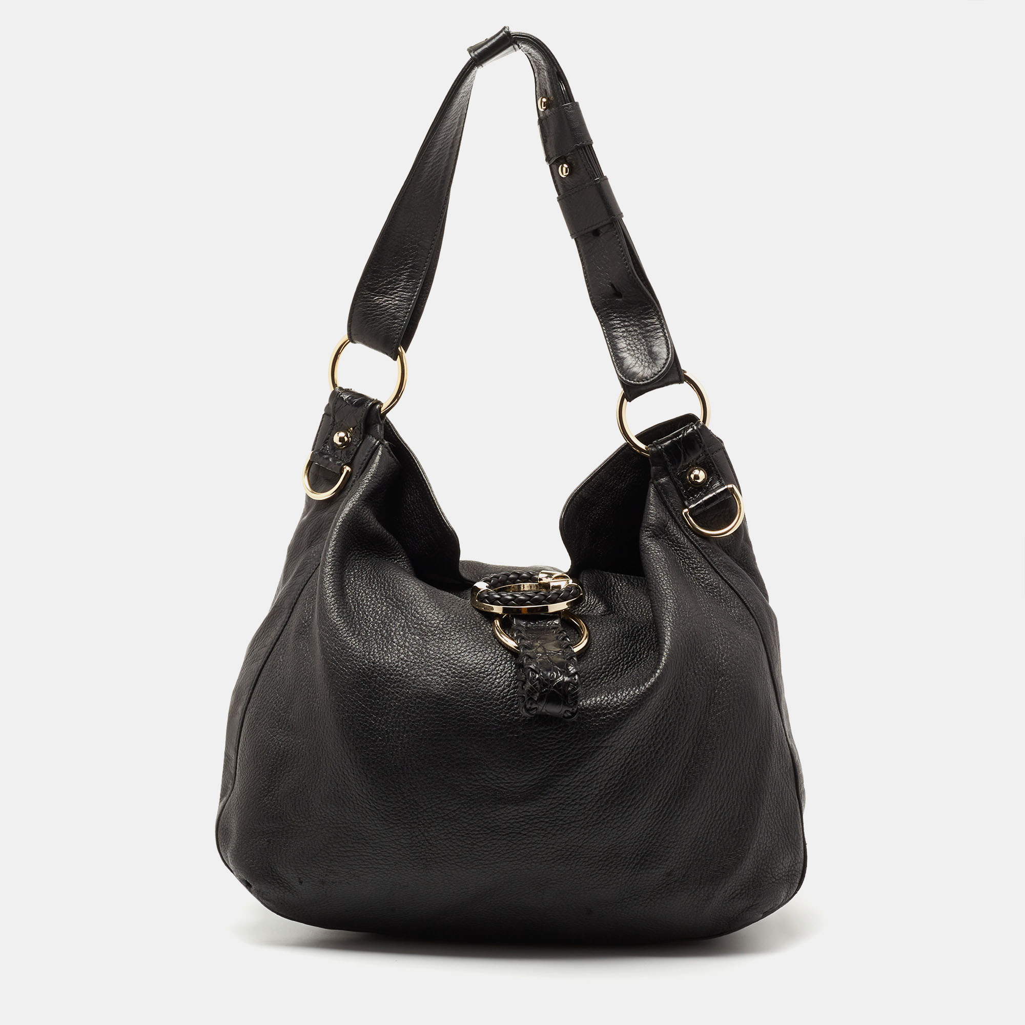 Flaunt your elevated fashion choice by accessorizing this G wave hobo from Gucci with your outfit. Crafted from leather with crocodile trims it is worth the investment. This bag is defined by a shoulder strap a striking lock on the front and a single handle. Lined with fabric it is capable of storing your daily essentials comfortably.