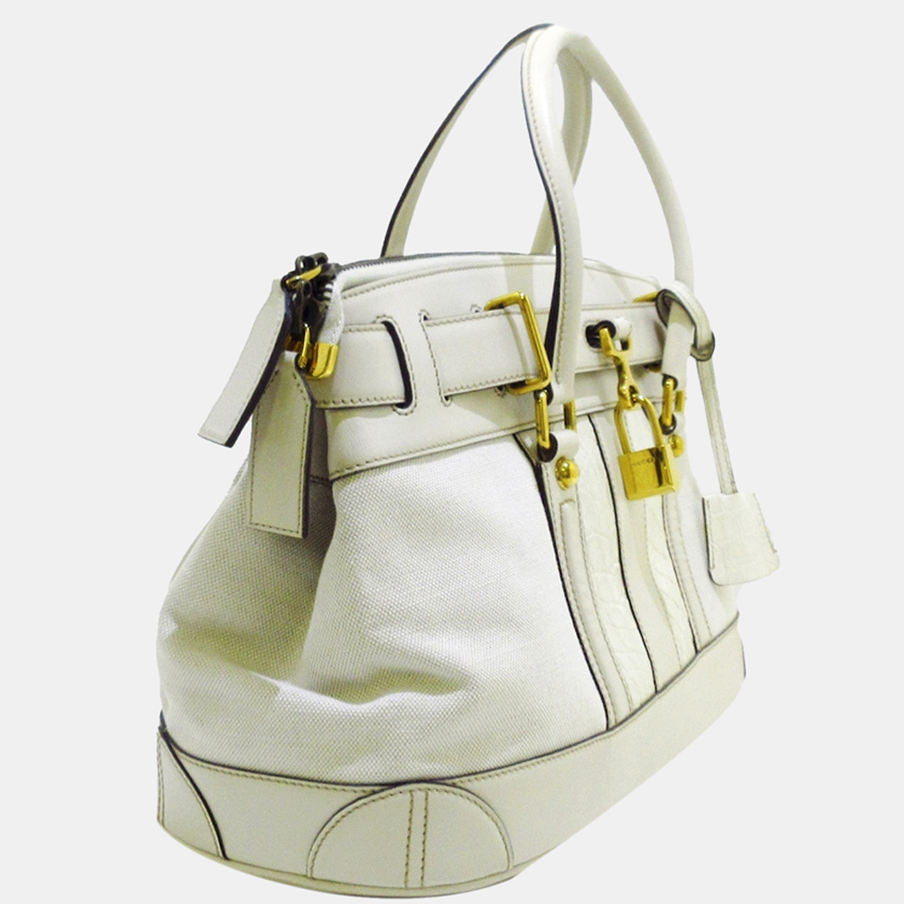 

Gucci White Canvas Secret Handbag