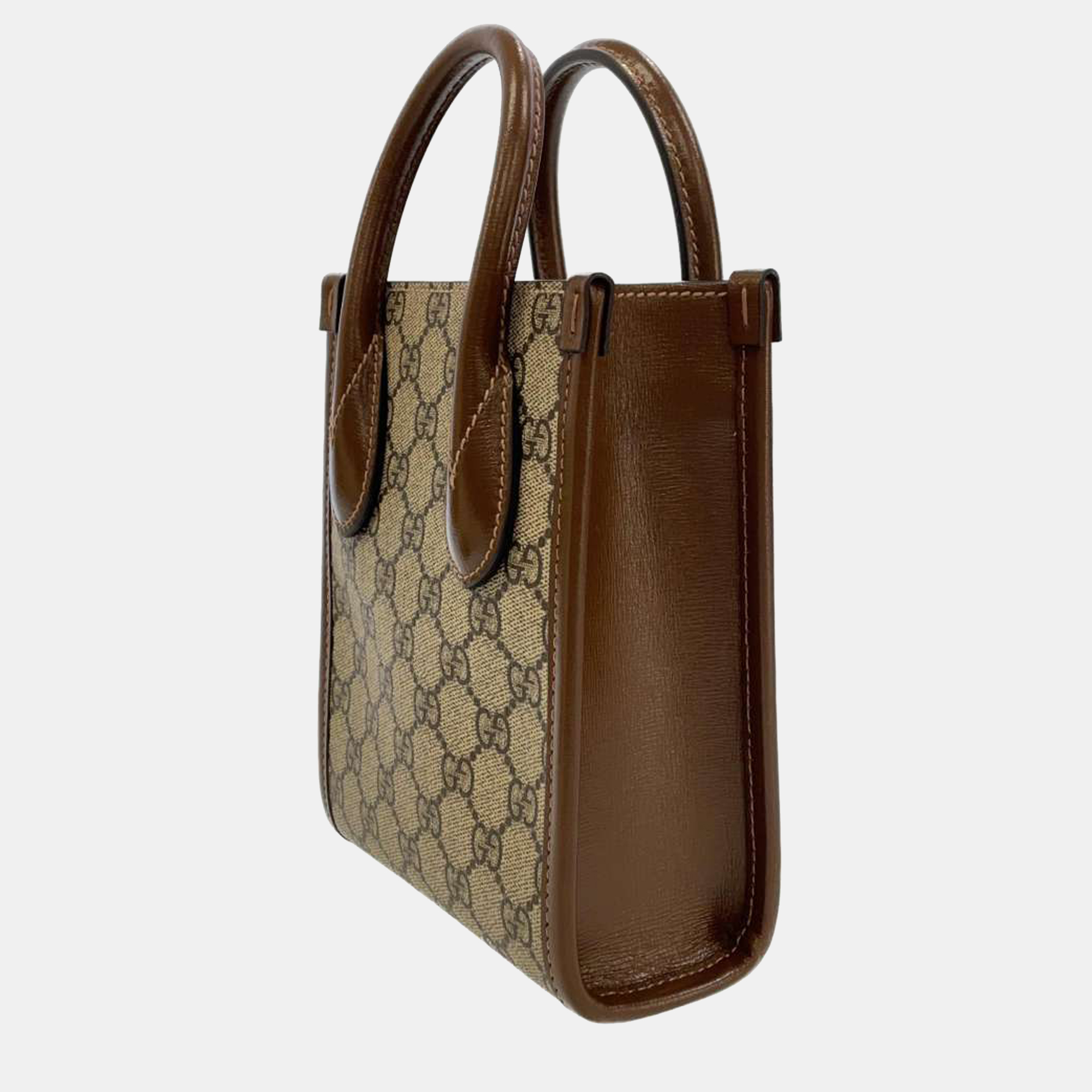 

Gucci Beige/Brown GG Canvas and Leather Interlocking G Mini Tote Bag
