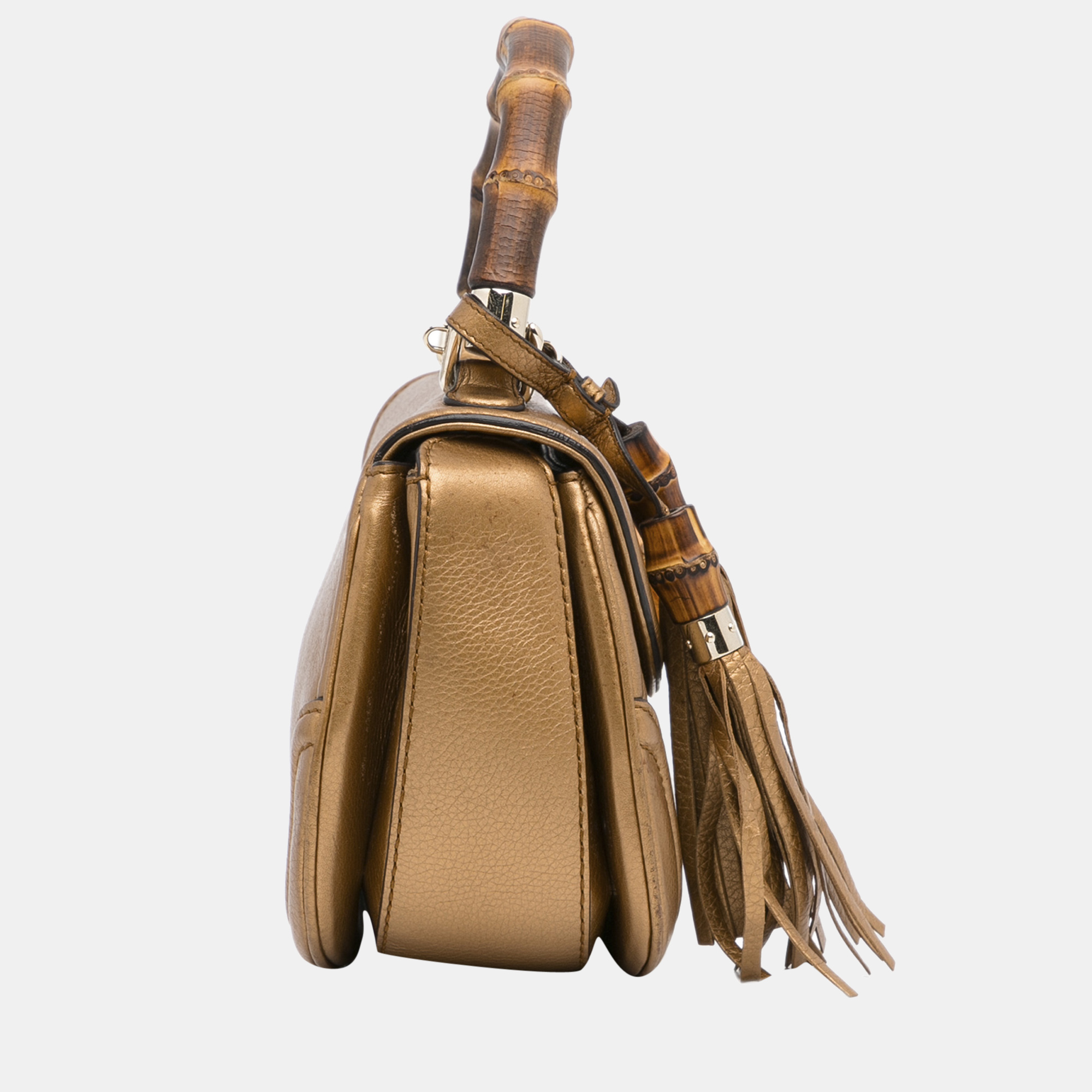 

Gucci Gold Bamboo Night