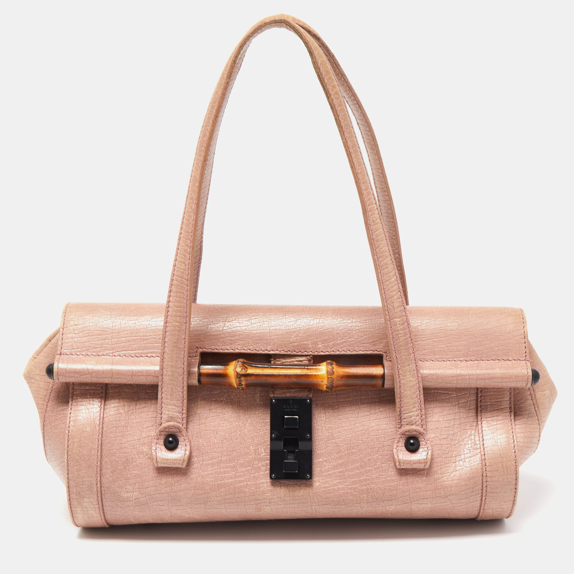 Stylish and easy to carry this designer satchel will be a fine choice for work or after. Lined well this pre loved bag for women can easily fit all your essentials. It can be held in your arm or hand.