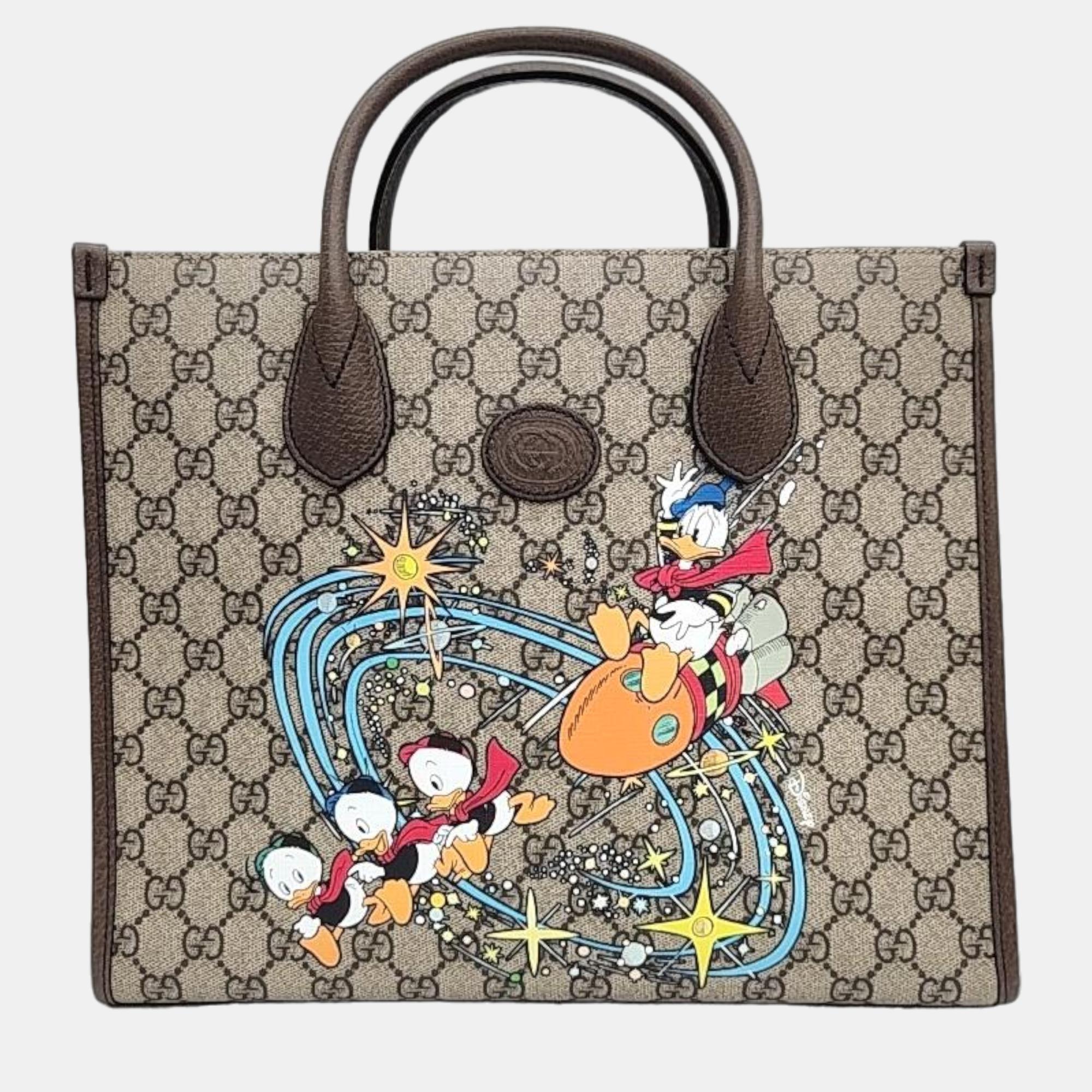 GUCCI DISNEY GG SUPREME SMALL DONALD DUCK TOTE BAG - Still in fashion