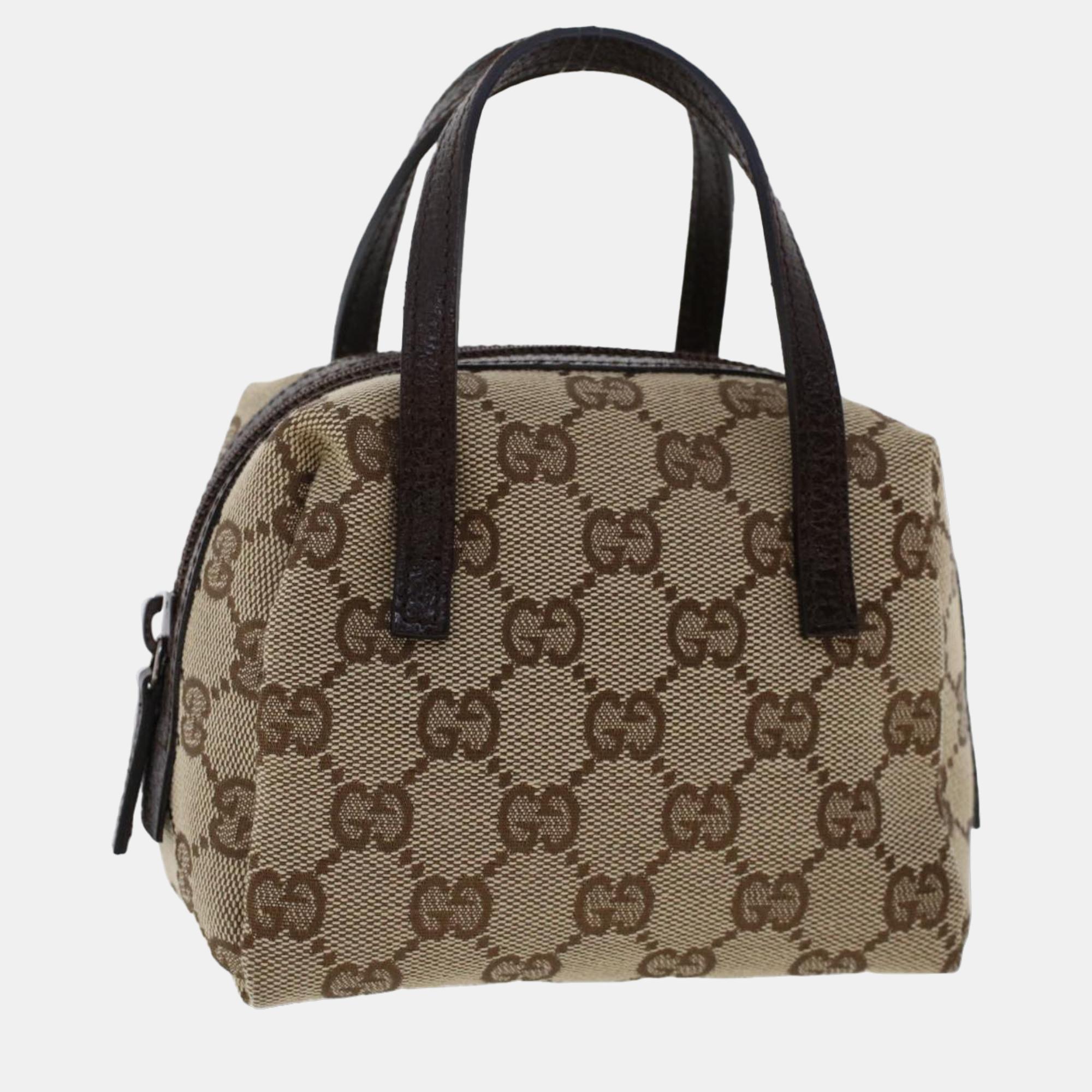 

Gucci Beige Canvas GG canvas clutch bag
