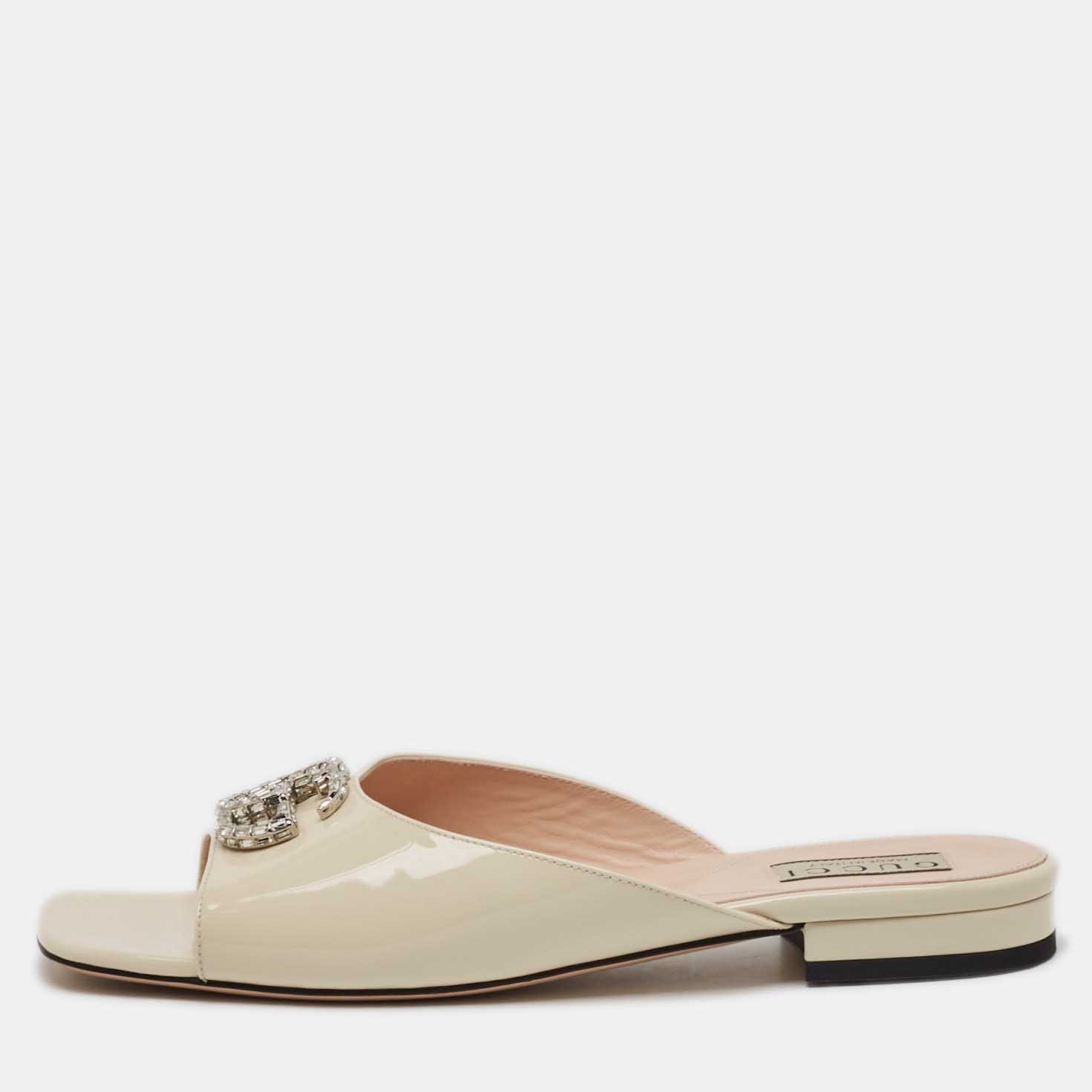 

Gucci Cream Patent Leather GG Crystal Embellished Mules Size