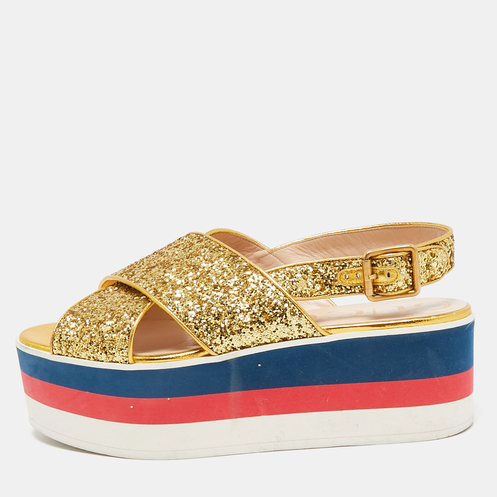 

Gucci Gold Glitter Leather Crossover Platform Sandals Size