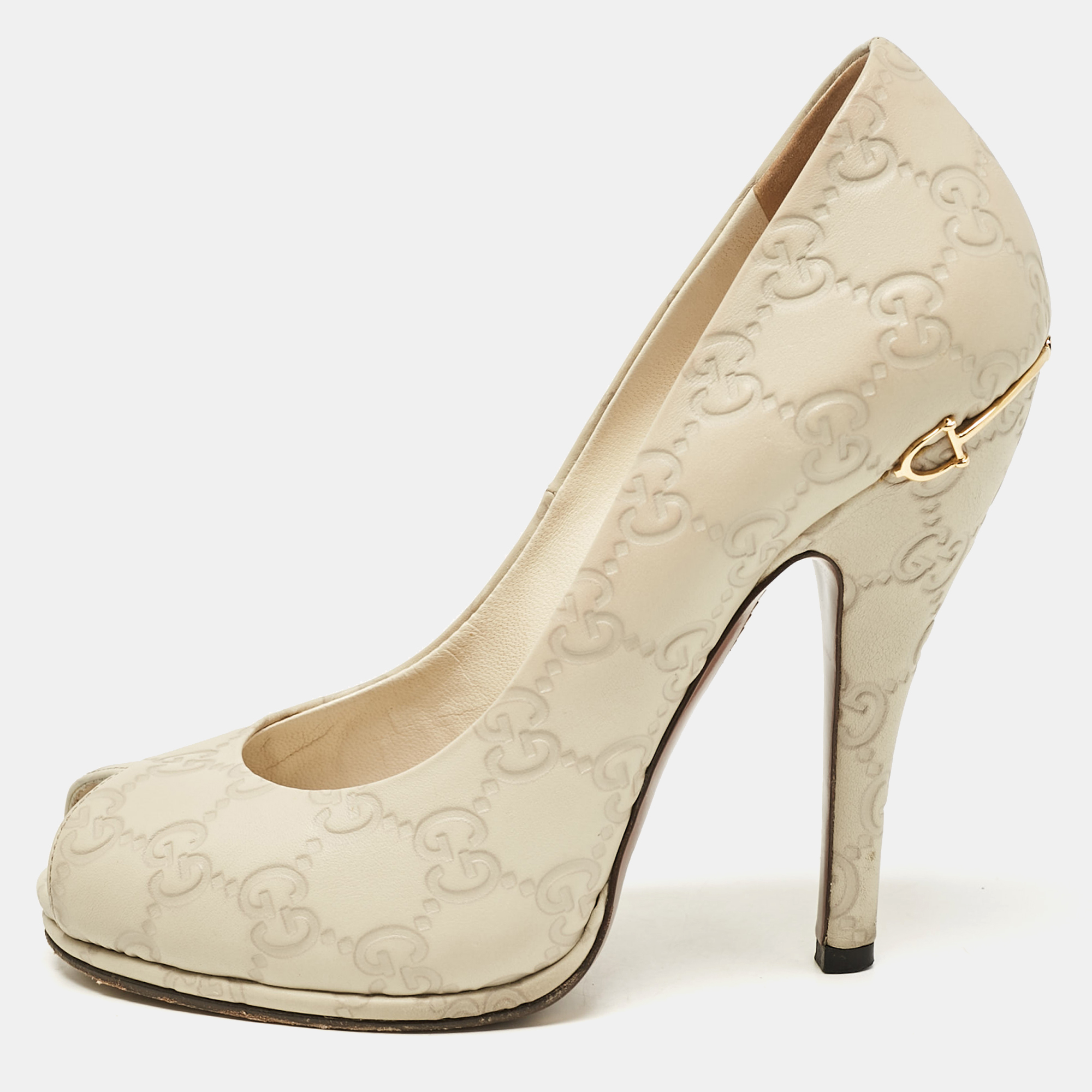 

Gucci Cream Guccissima Leather Peep Toe Pumps Size