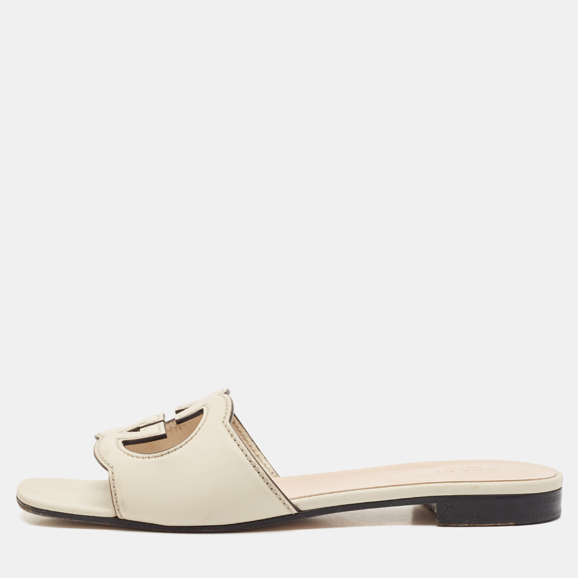 

Gucci Cream Leather GG Cut Out Flat Slides Size